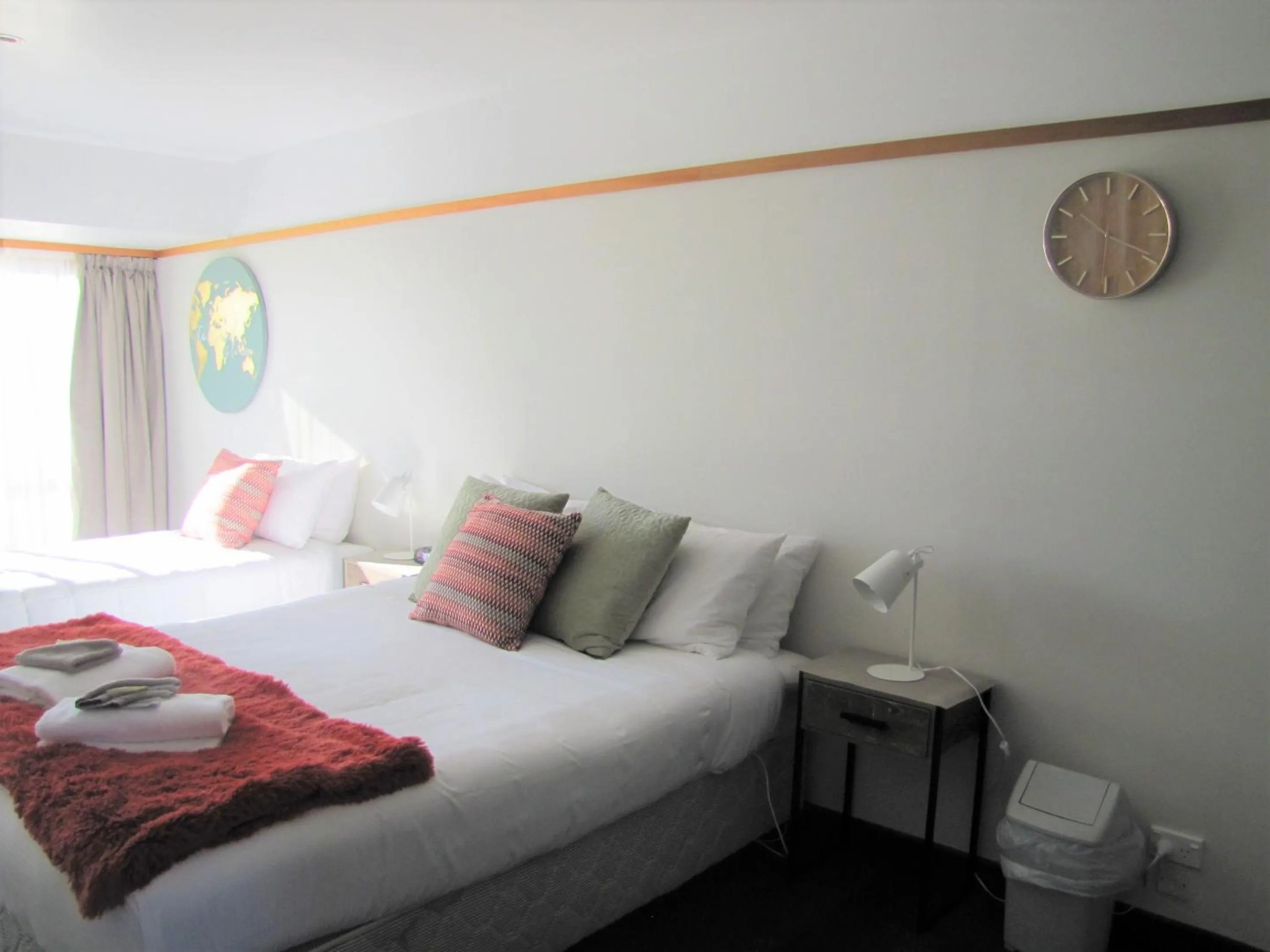 Bed in The Beachcomber Hotel