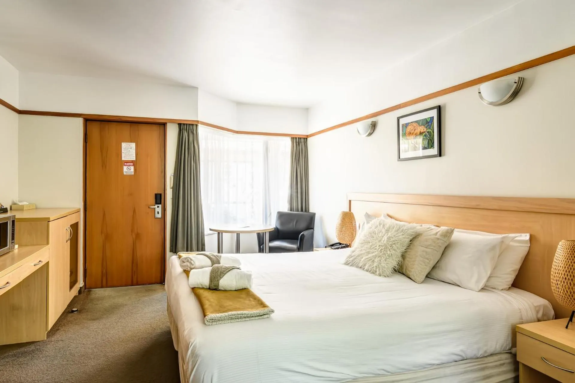 Bed in The Beachcomber Hotel