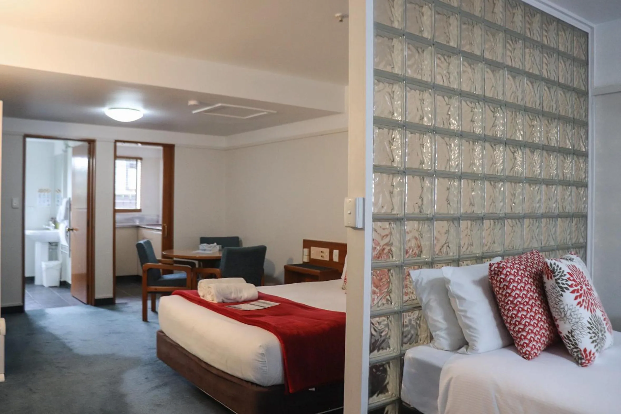 Bed in The Beachcomber Hotel