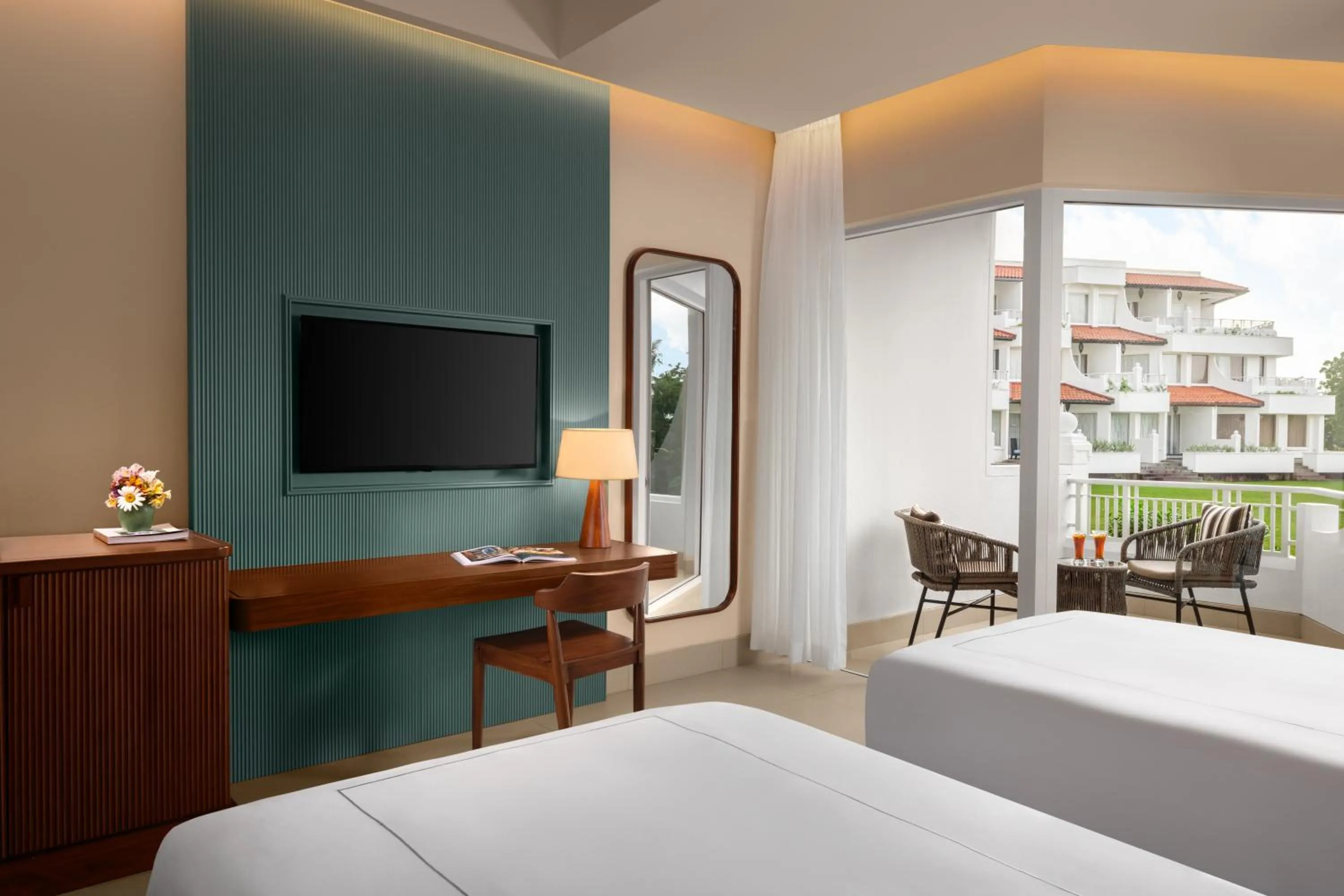 Seating area, Bed in Taj Bentota Resort & Spa