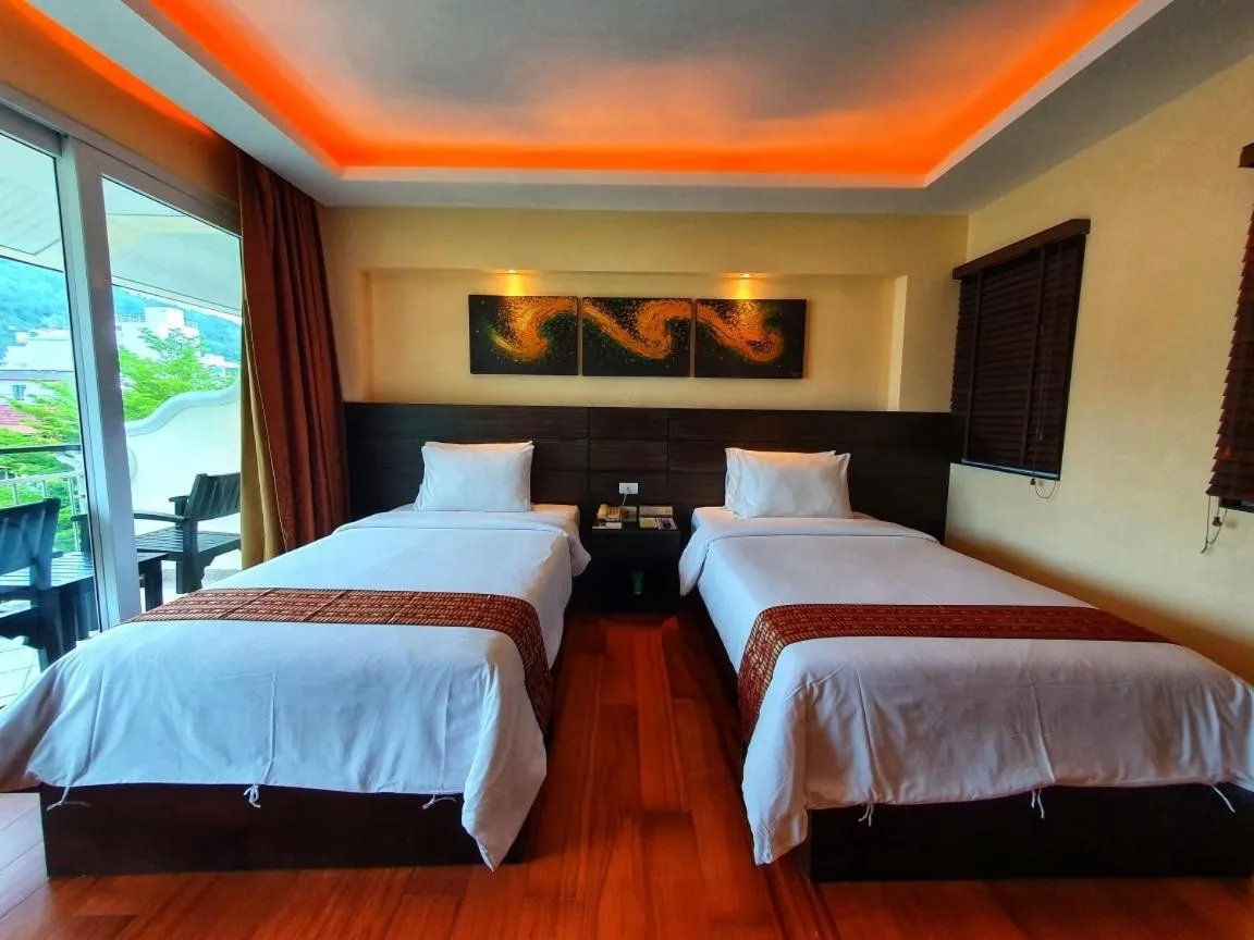 Bed in R-Mar Resort and Spa Patong, Phuket