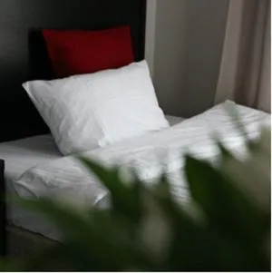 Bed in Comm Hotel Poznań Airport