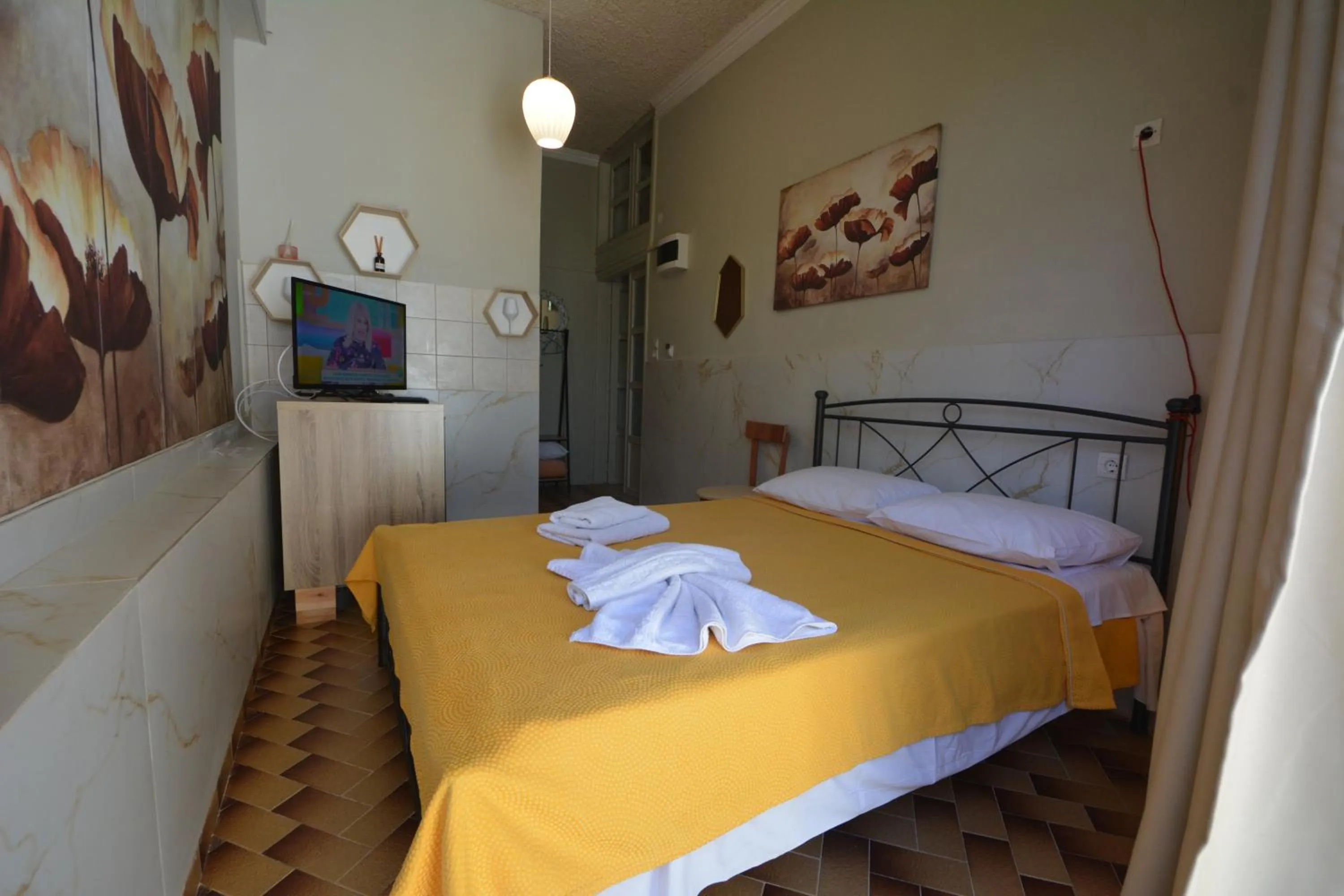 Bed in Bikakis Family Apartments