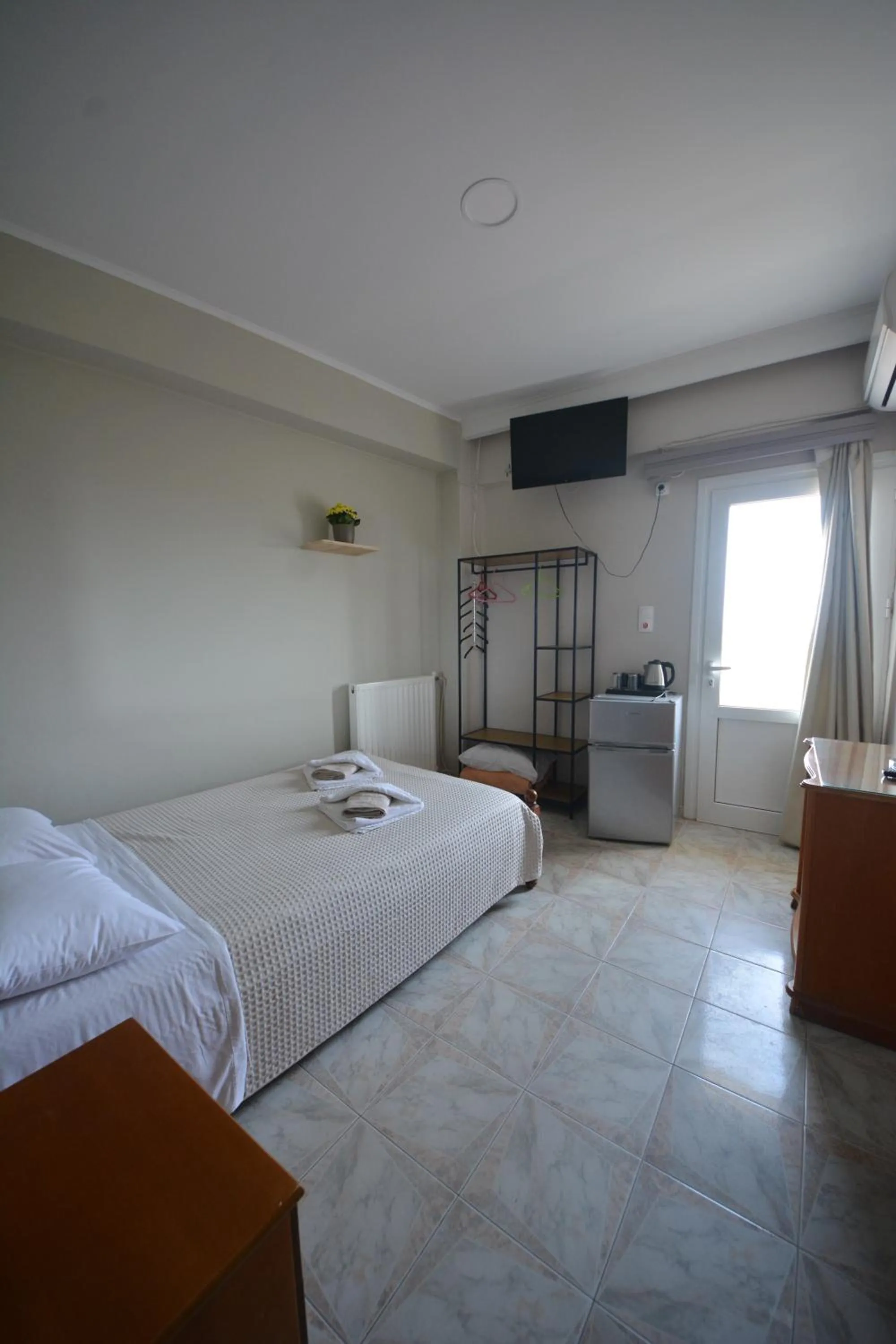 Bed in Bikakis Family Apartments