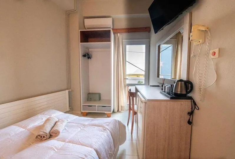 Bed in Bikakis Family Apartments