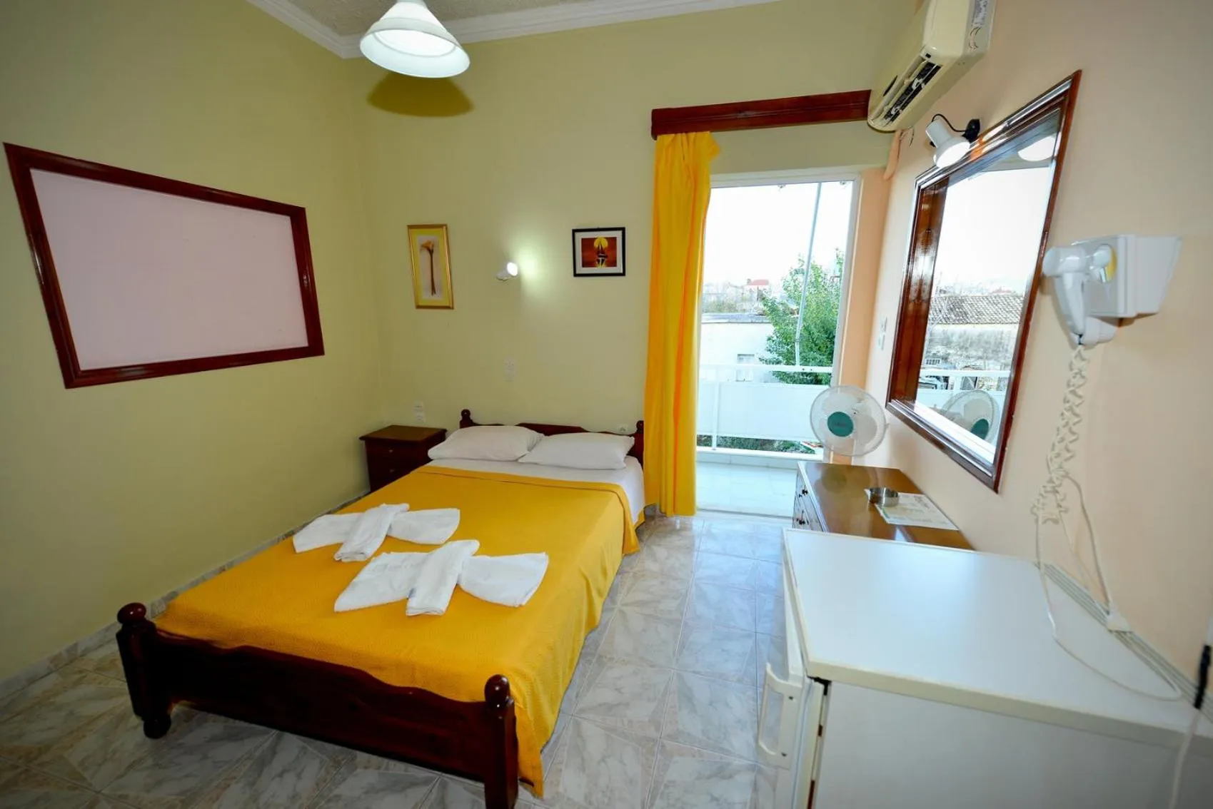 Bed in Bikakis Family Apartments