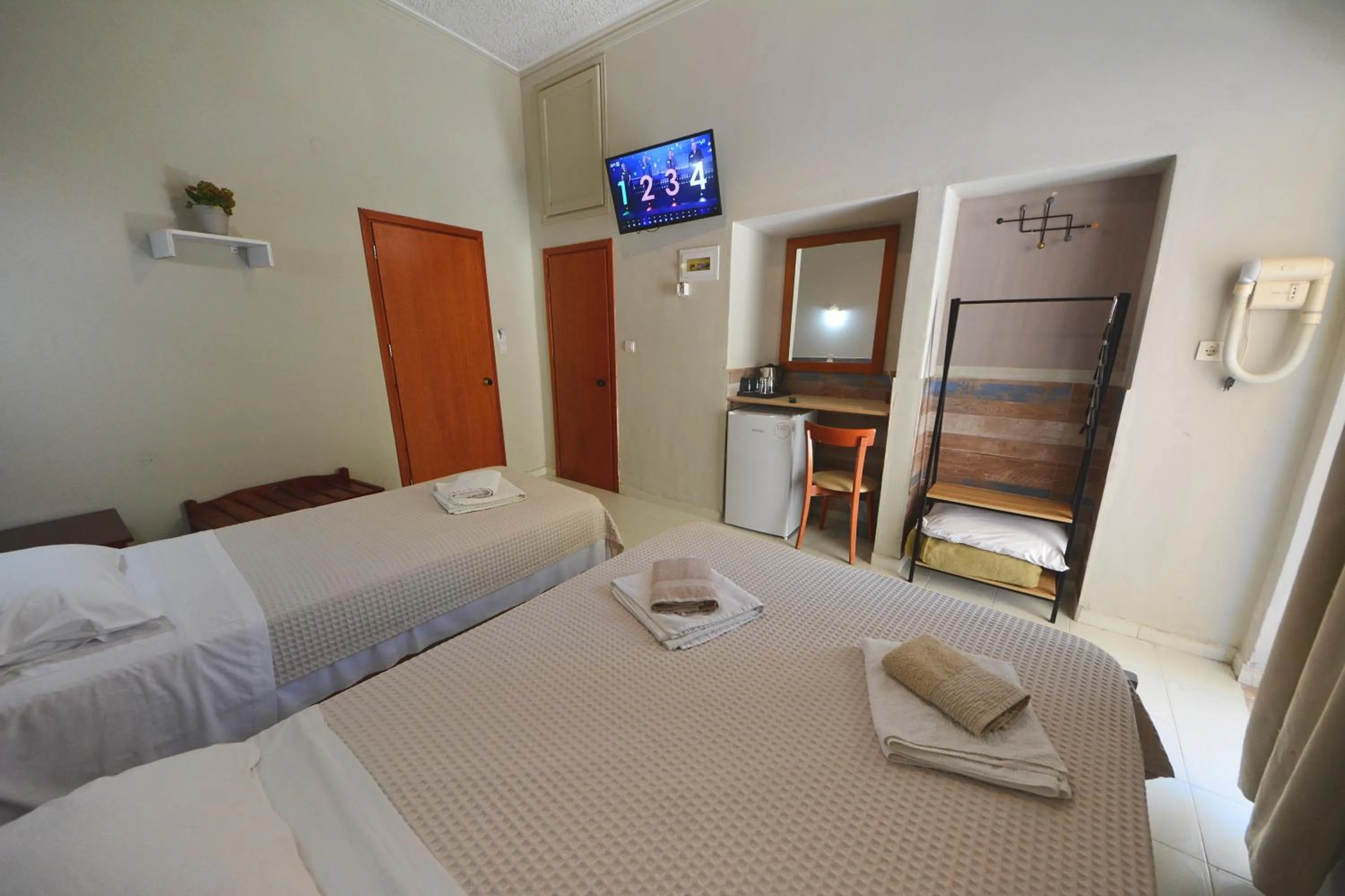 Bed in Bikakis Family Apartments