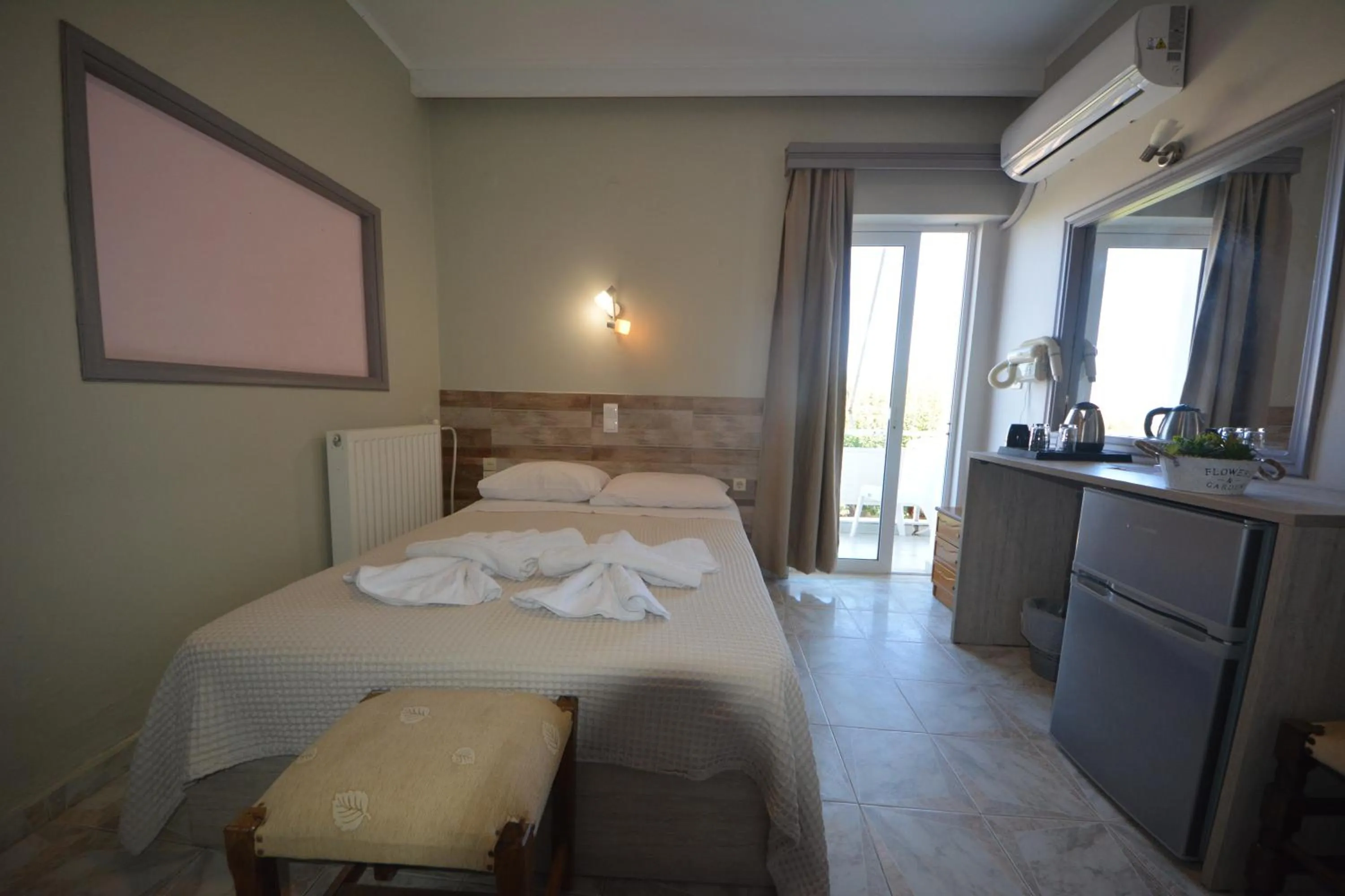 Bed in Bikakis Family Apartments