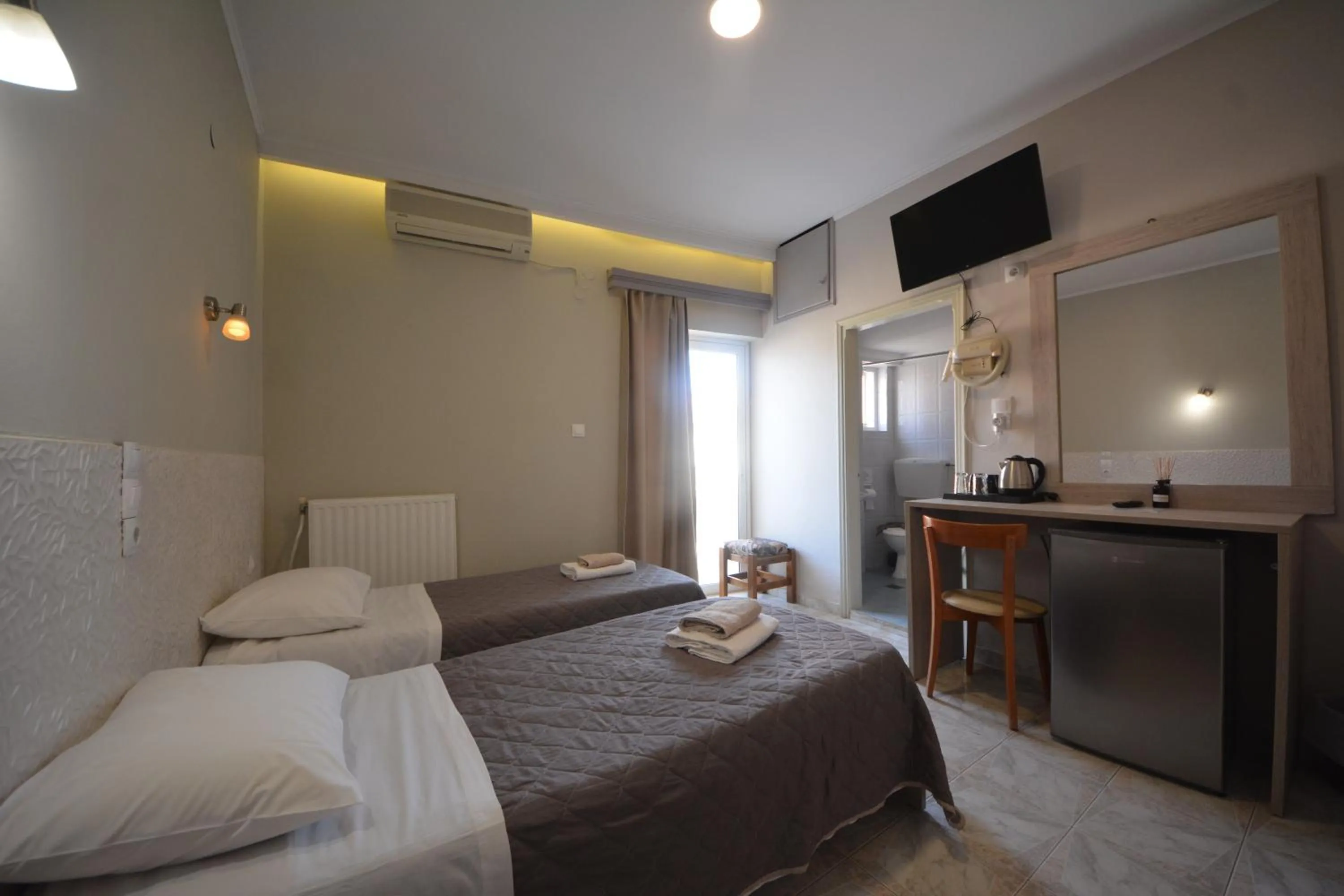 Bed in Bikakis Family Apartments