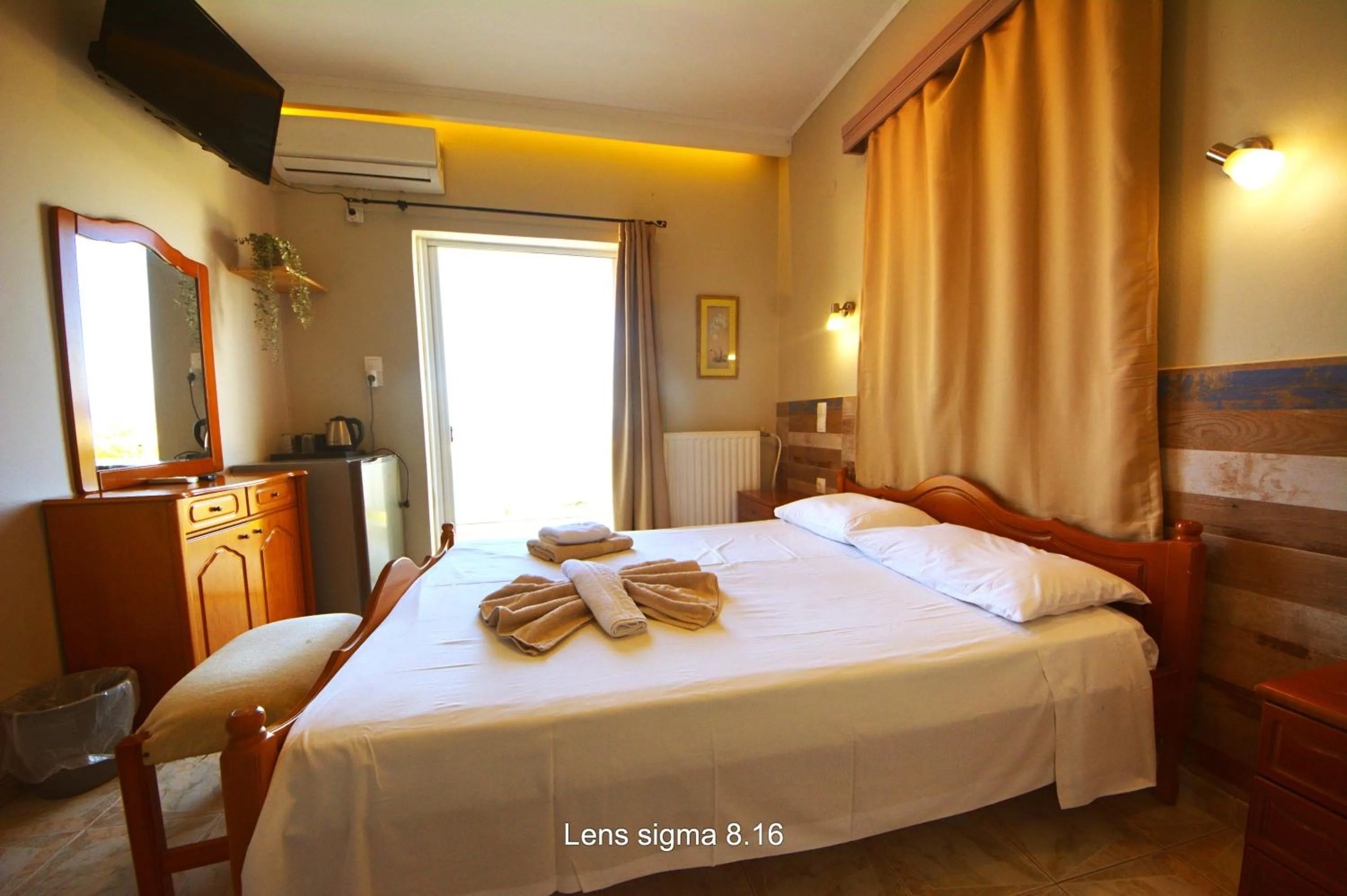 Bed in Bikakis Family Apartments