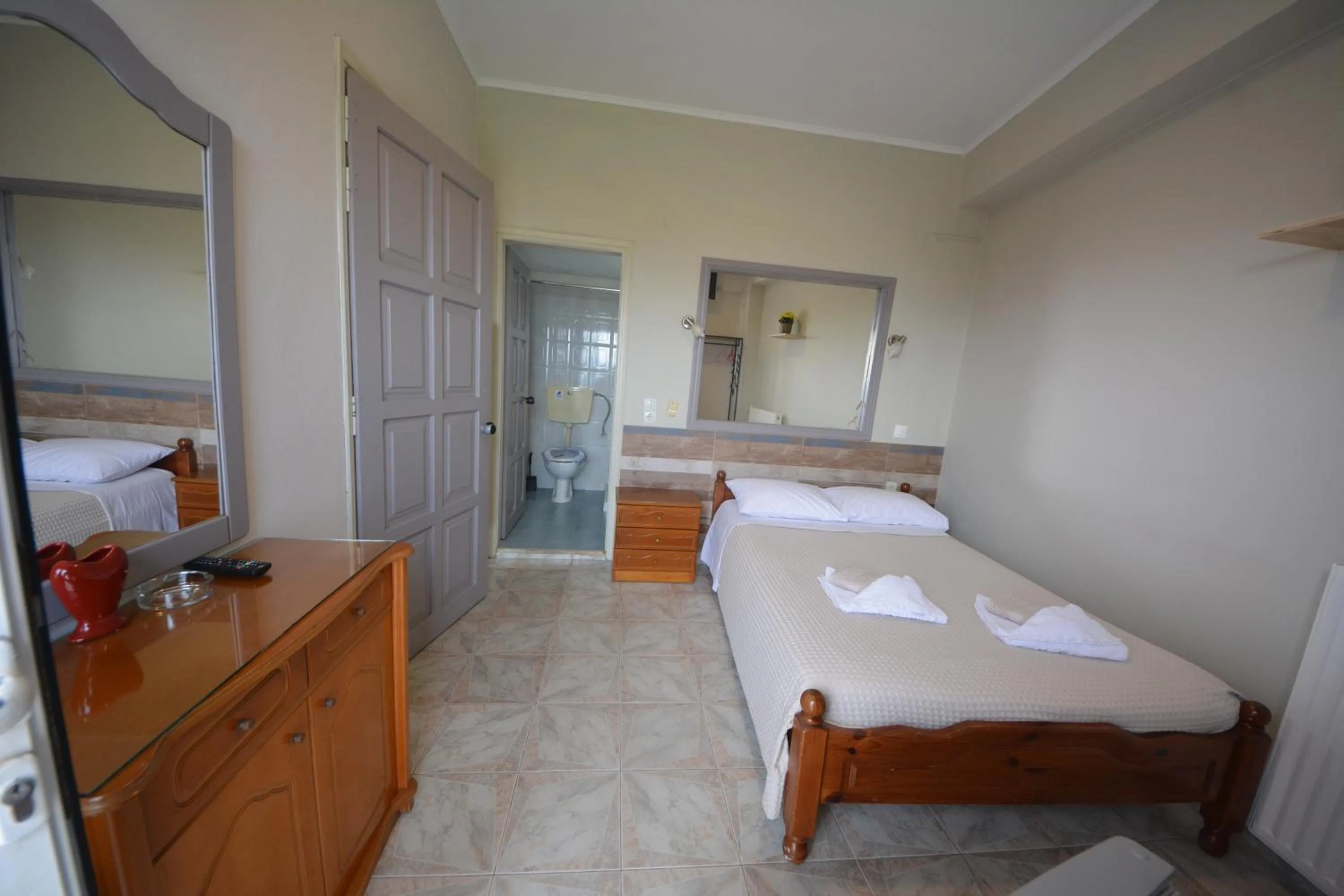 Bed in Bikakis Family Apartments