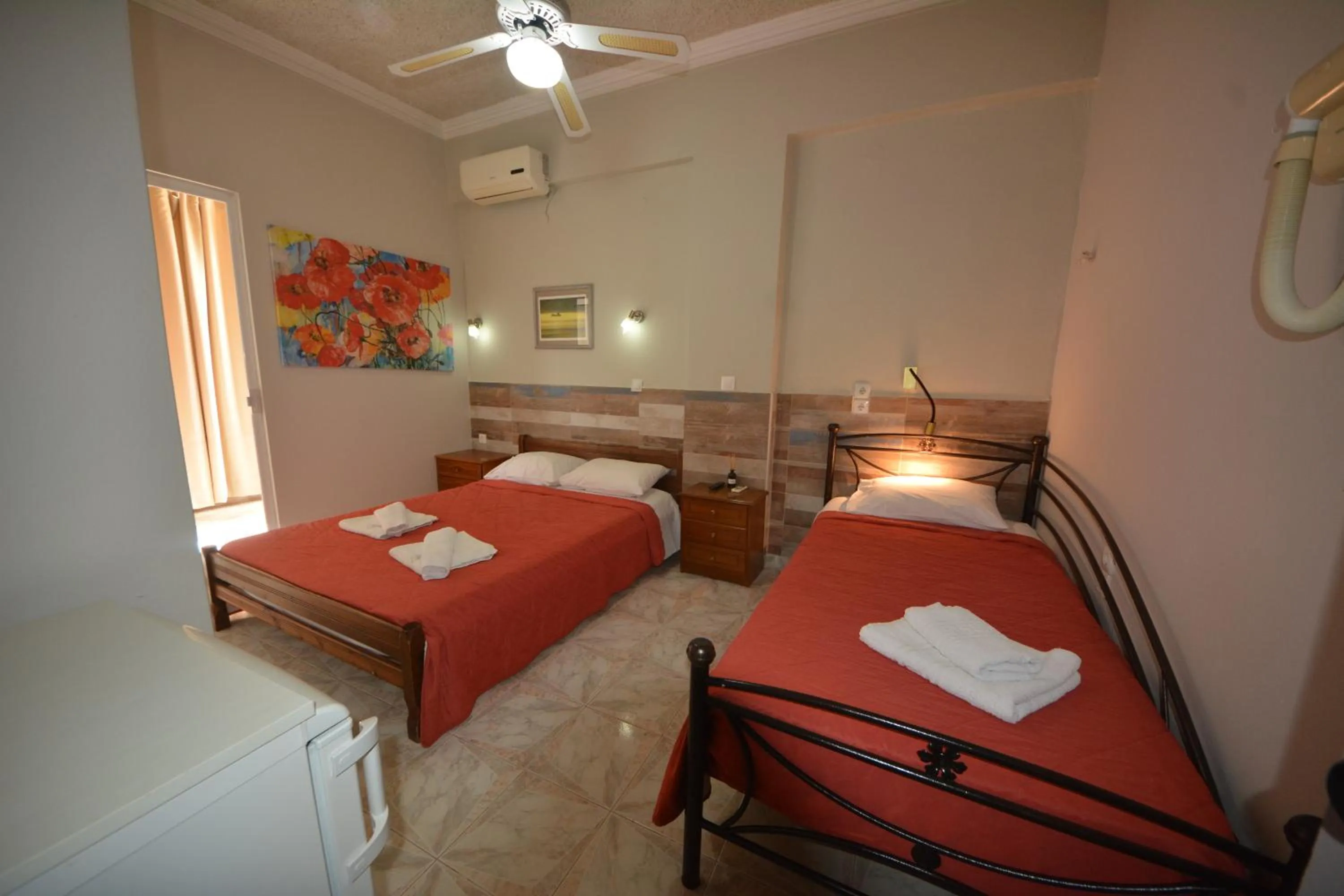 Bed in Bikakis Family Apartments