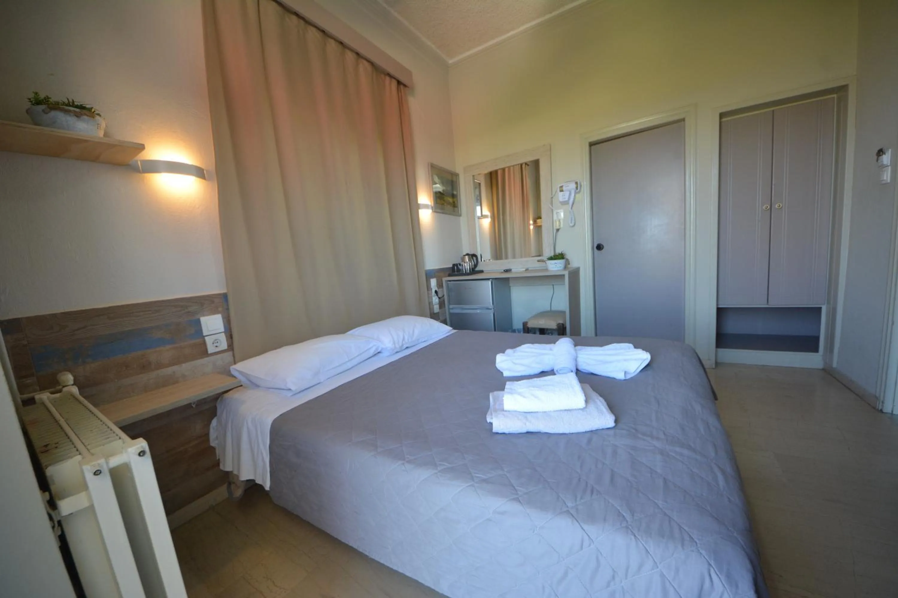 Bed in Bikakis Family Apartments