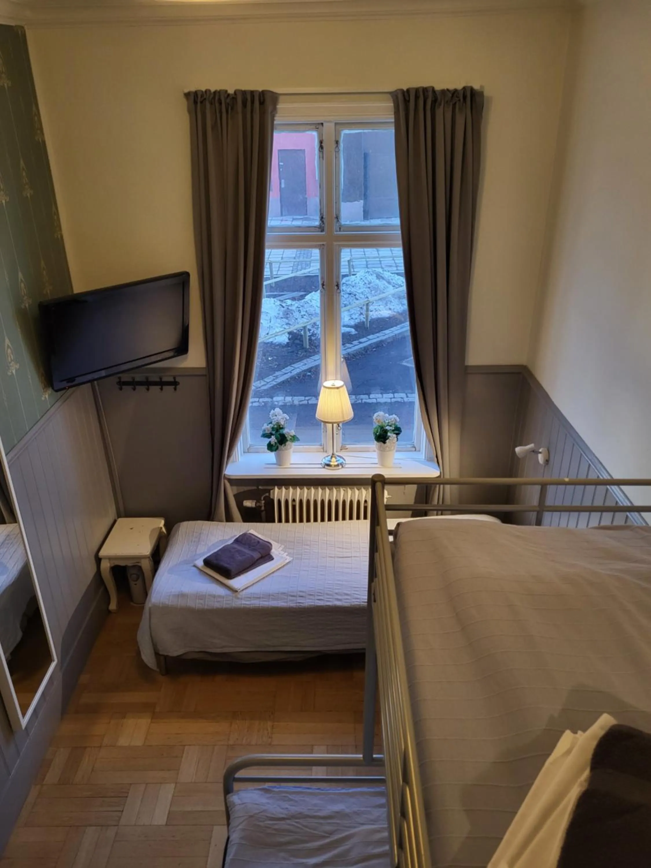 Triple Room with Shared Bathroom in Vandrarhem Uppsala Kungsängstorg