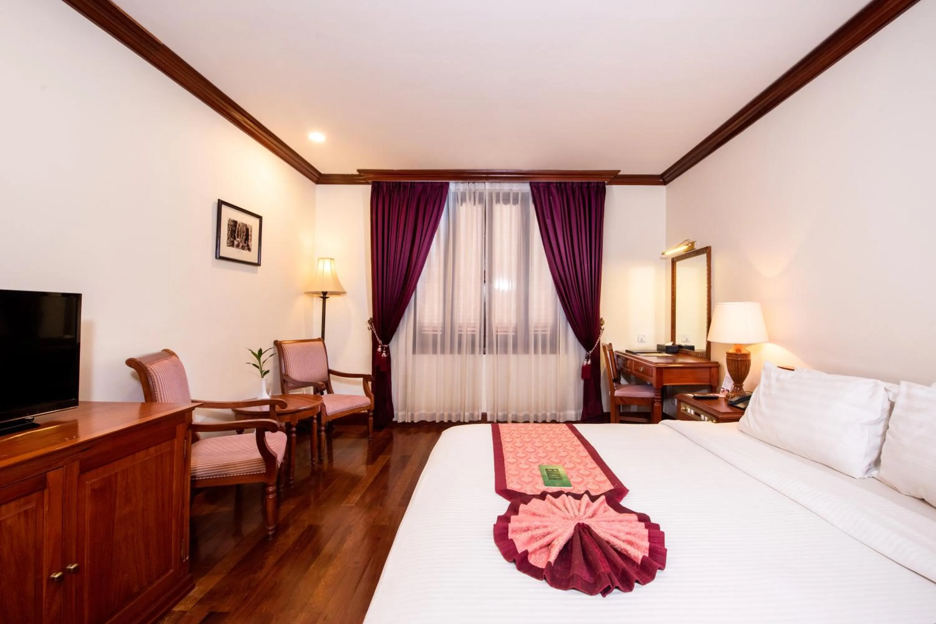 Photo of the whole room, Bed in Steung Siemreap Hotel