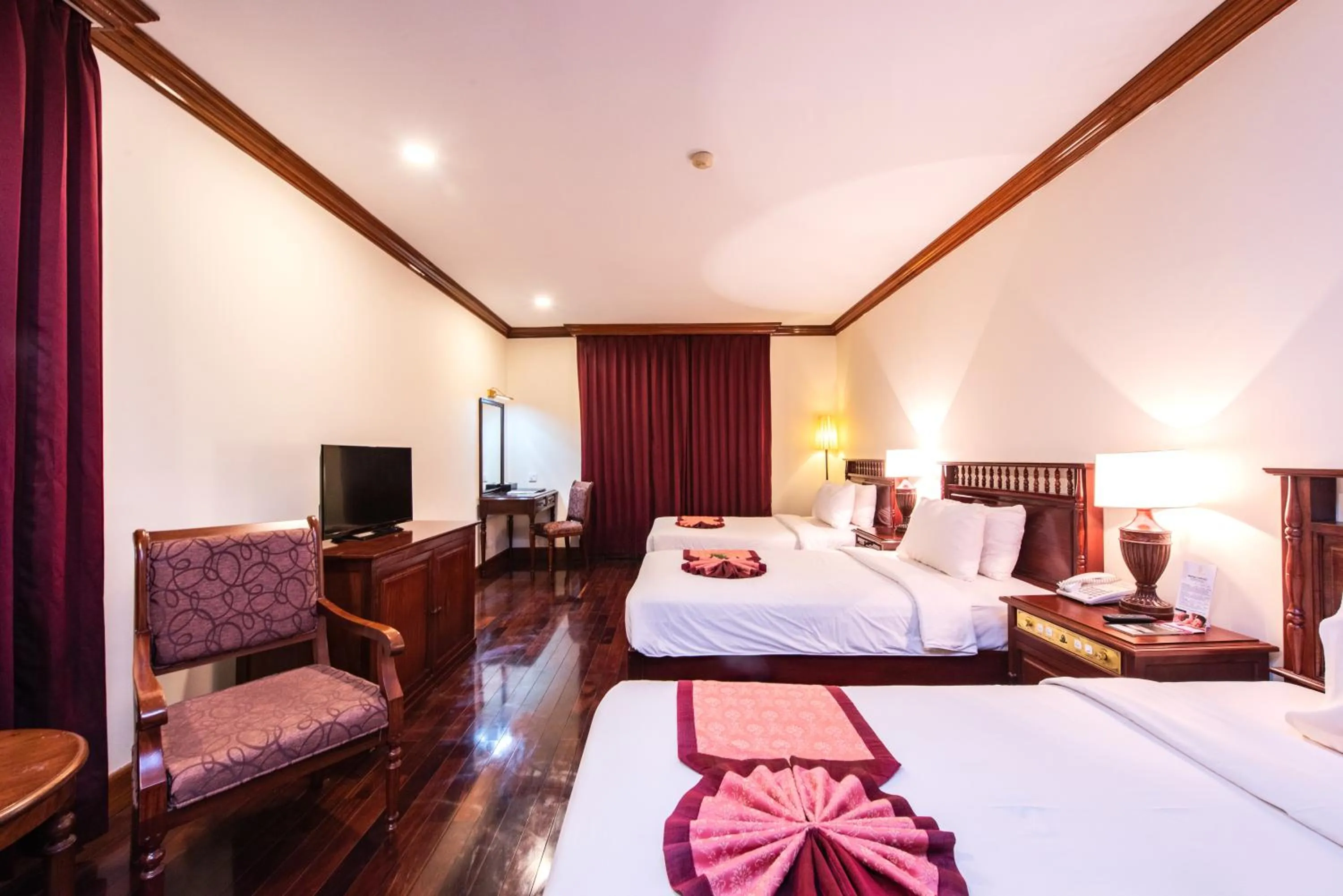 Photo of the whole room, Bed in Steung Siemreap Hotel
