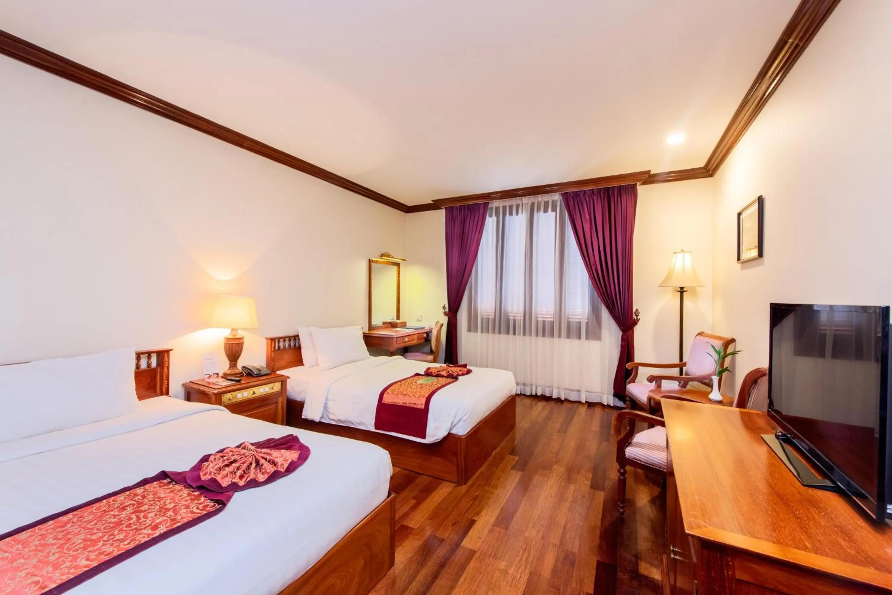 Photo of the whole room, Bed in Steung Siemreap Hotel