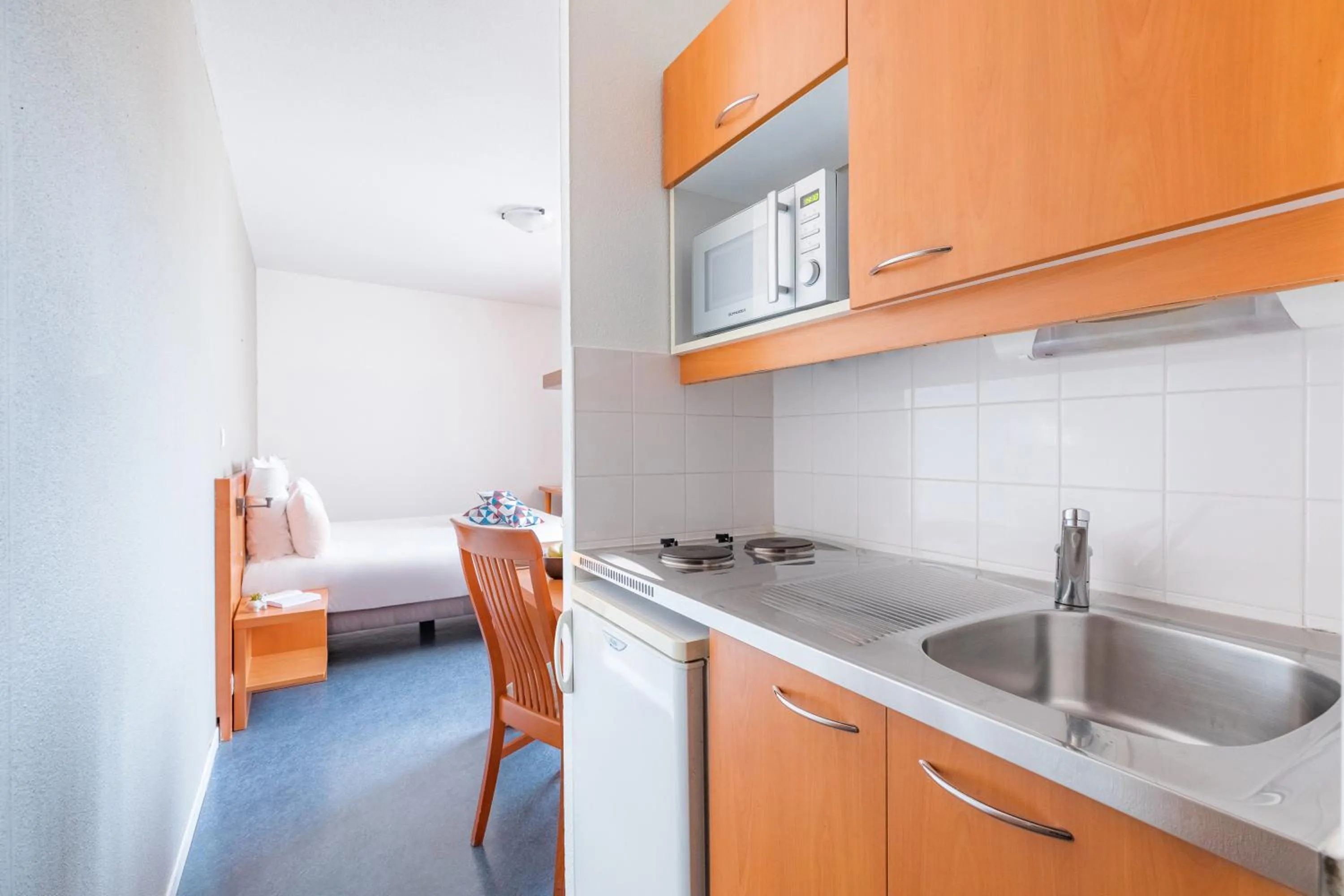 Kitchen or kitchenette in Appart’City Confort Lyon Gerland