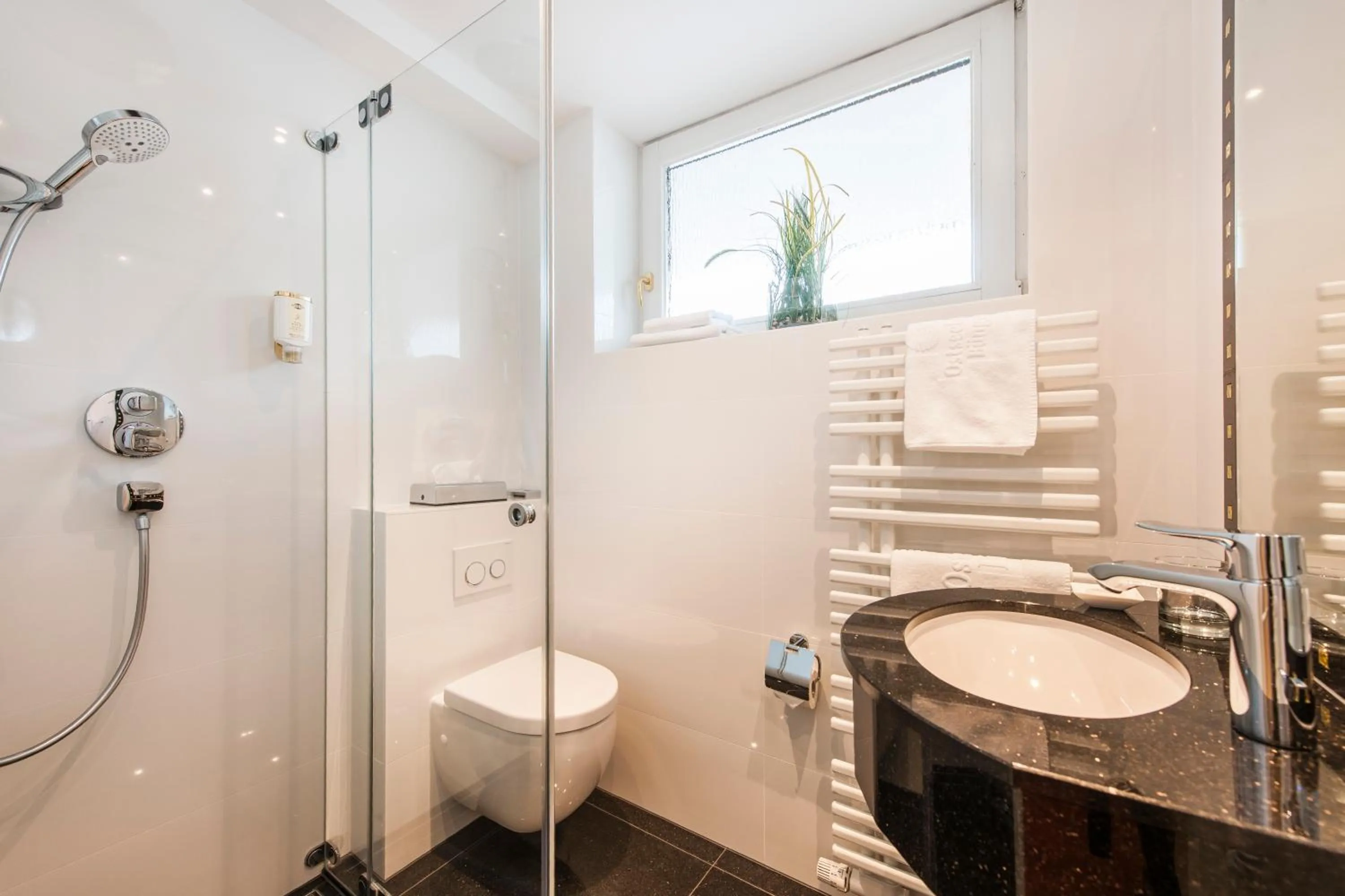 Bathroom in Büngers Apartment-Hotel mit Gartensauna - modern, gemütlich und strandnah