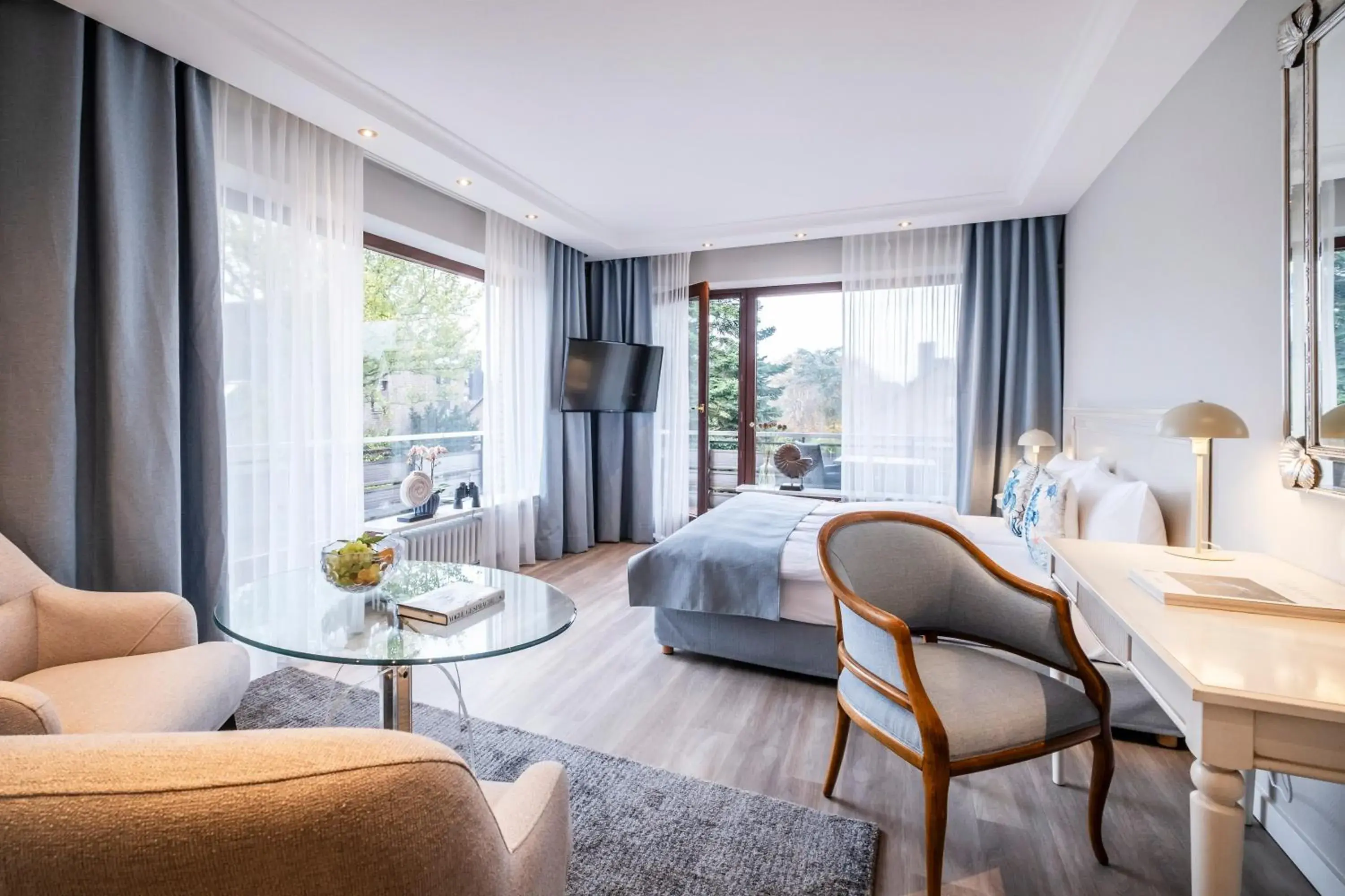 Junior Suite with Balcony and Garden View (4 Adults) in Büngers Apartment-Hotel mit Gartensauna - modern, gemütlich und strandnah Junior Suite with Balcony and Garden View (4 Adults) in Büngers Apartment-Hotel mit Gartensauna - modern, gemütlich und strandnah