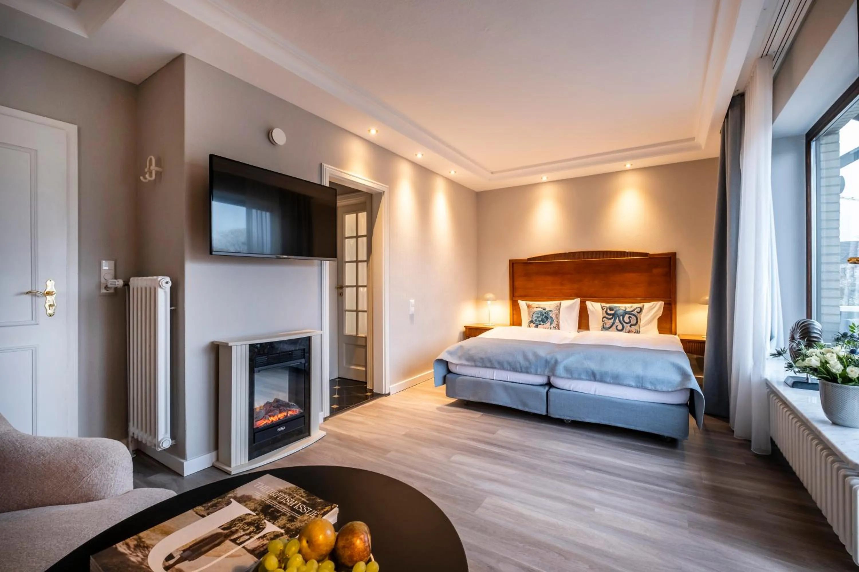 Photo of the whole room, Bed in Büngers Apartment-Hotel mit Gartensauna - modern, gemütlich und strandnah