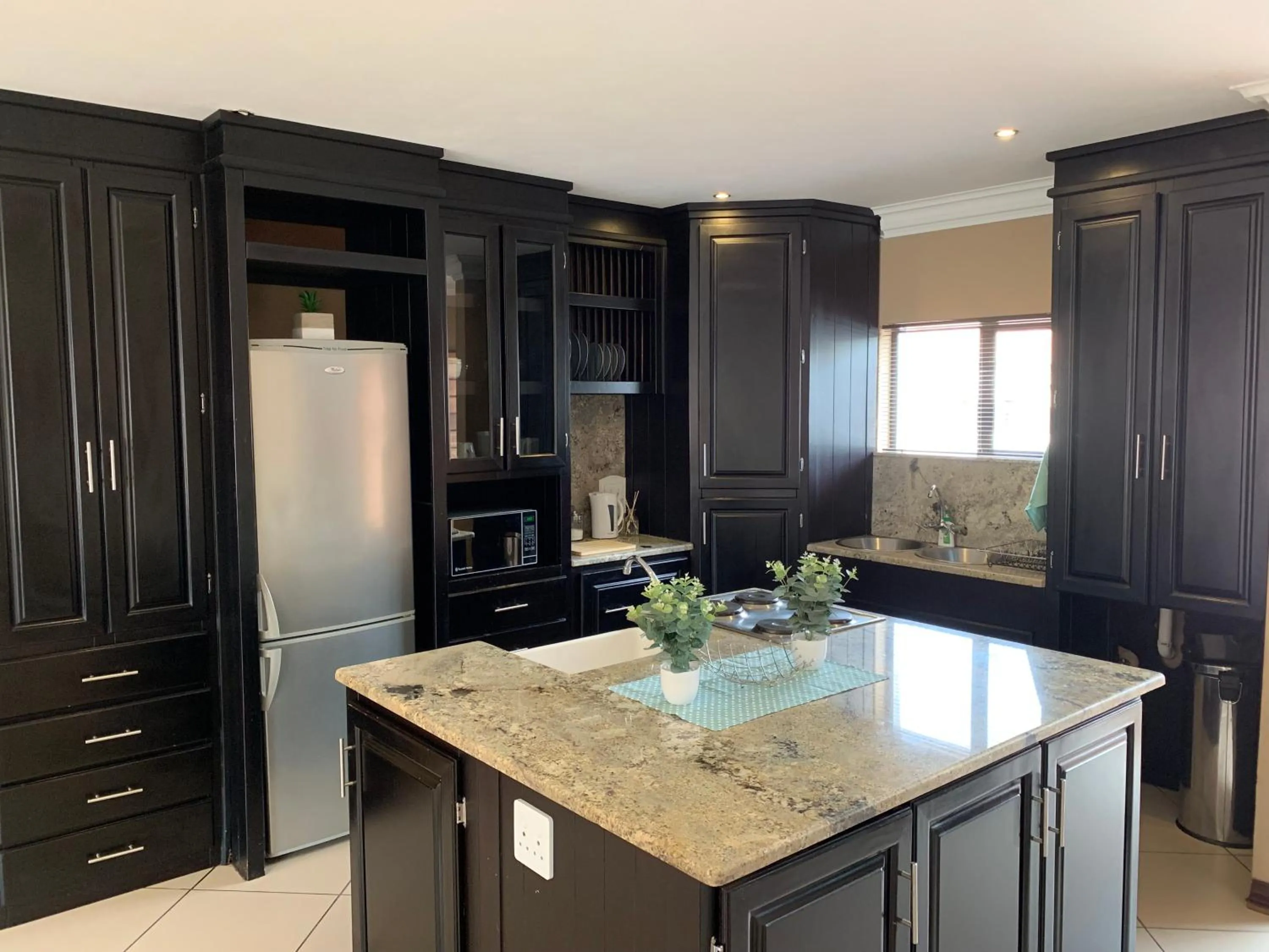 Kitchen or kitchenette in Picanha Guesthouse