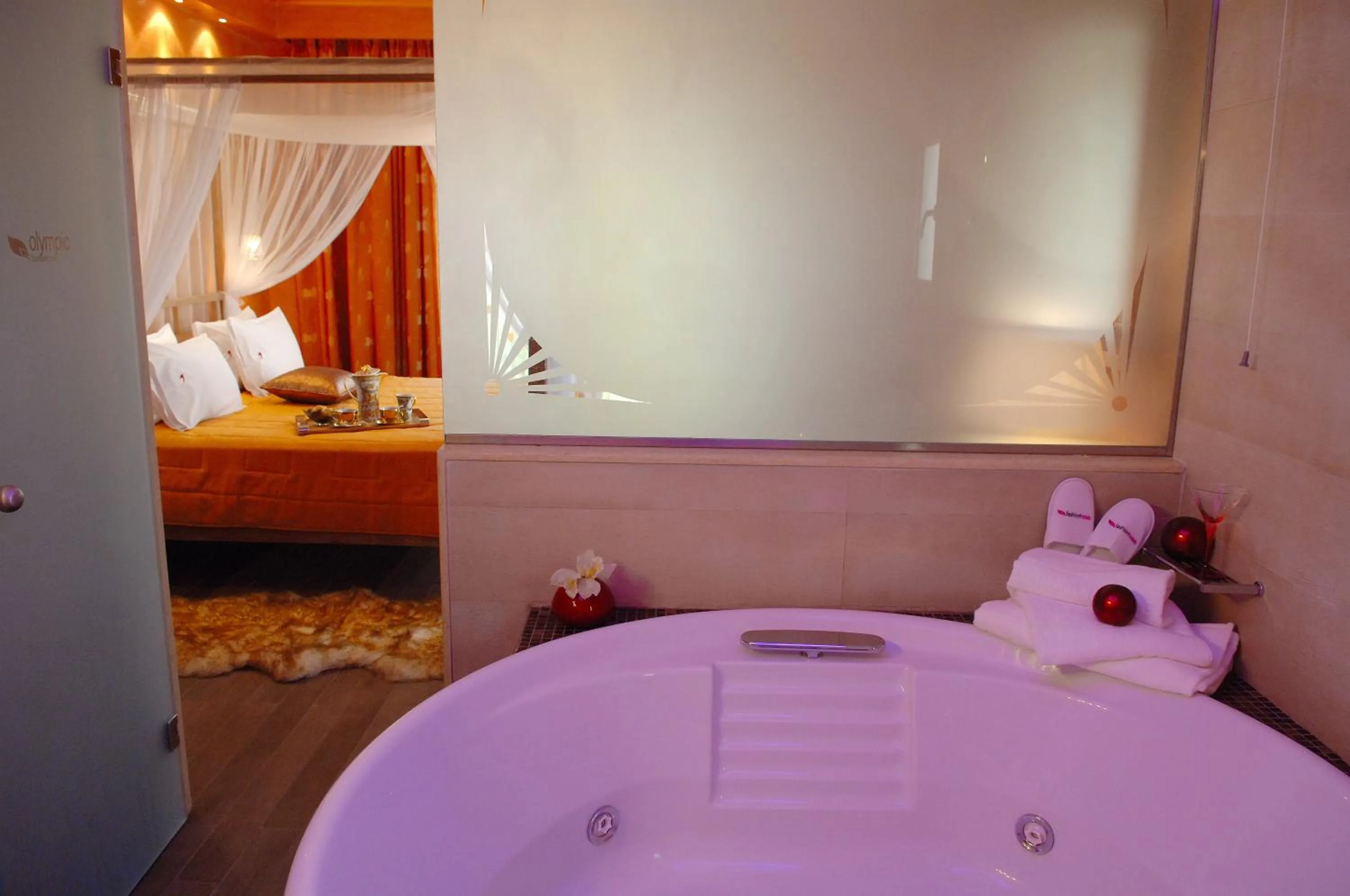 Shower, Bed in Olympic Fashion Hotels