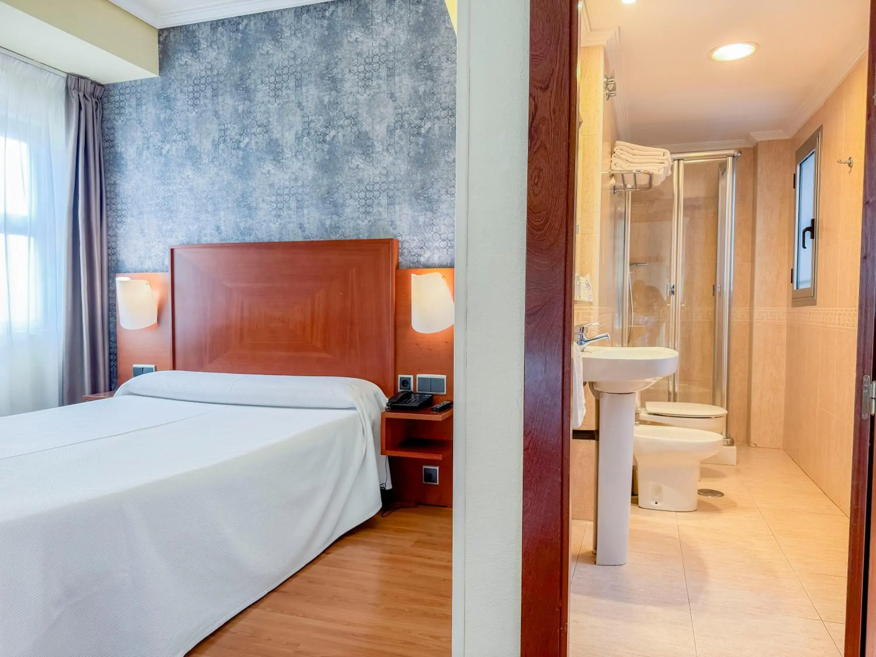 Bed in Torreluz Apartamentos Bed in Torreluz Apartamentos