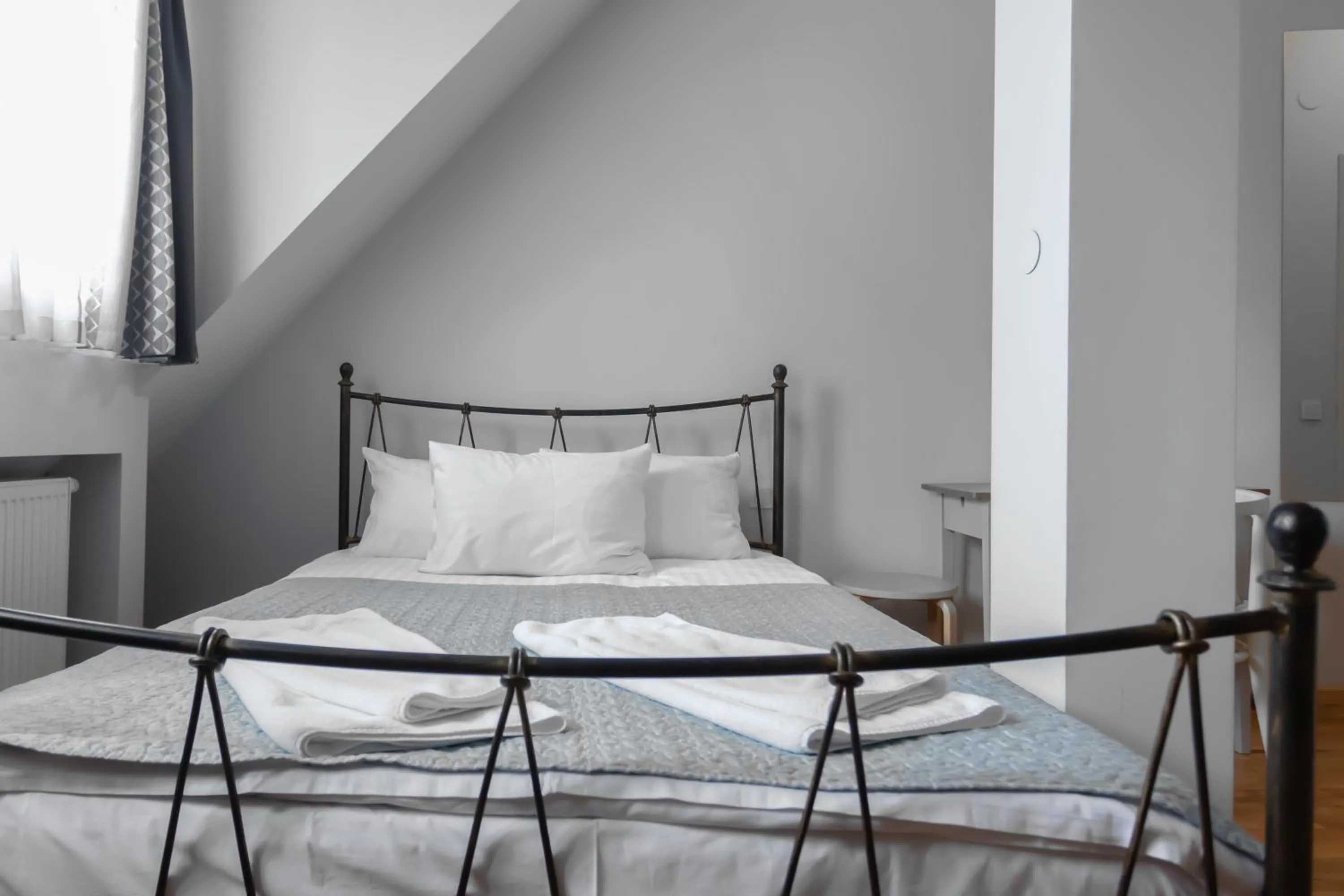 Bed in YellowBoot Aparthotel