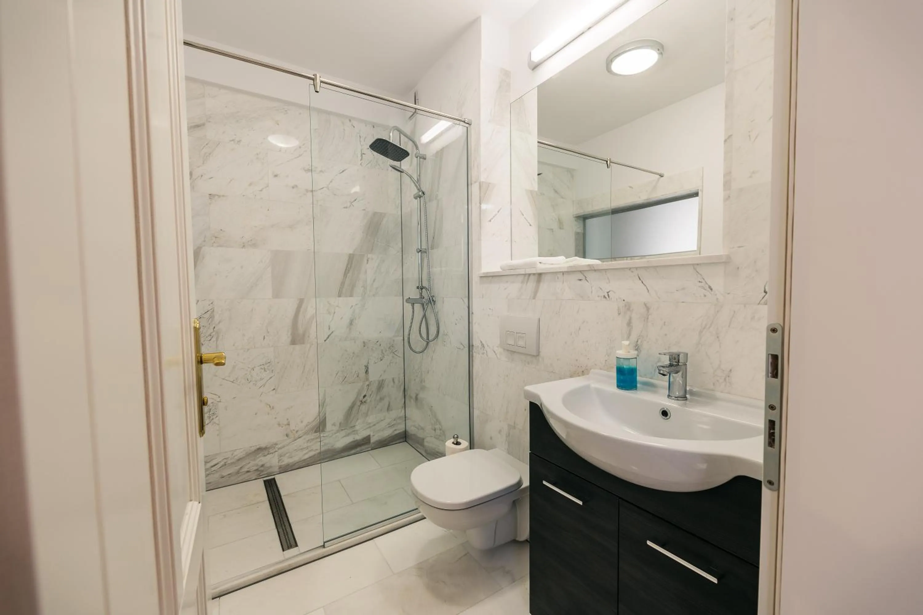 Shower in YellowBoot Aparthotel