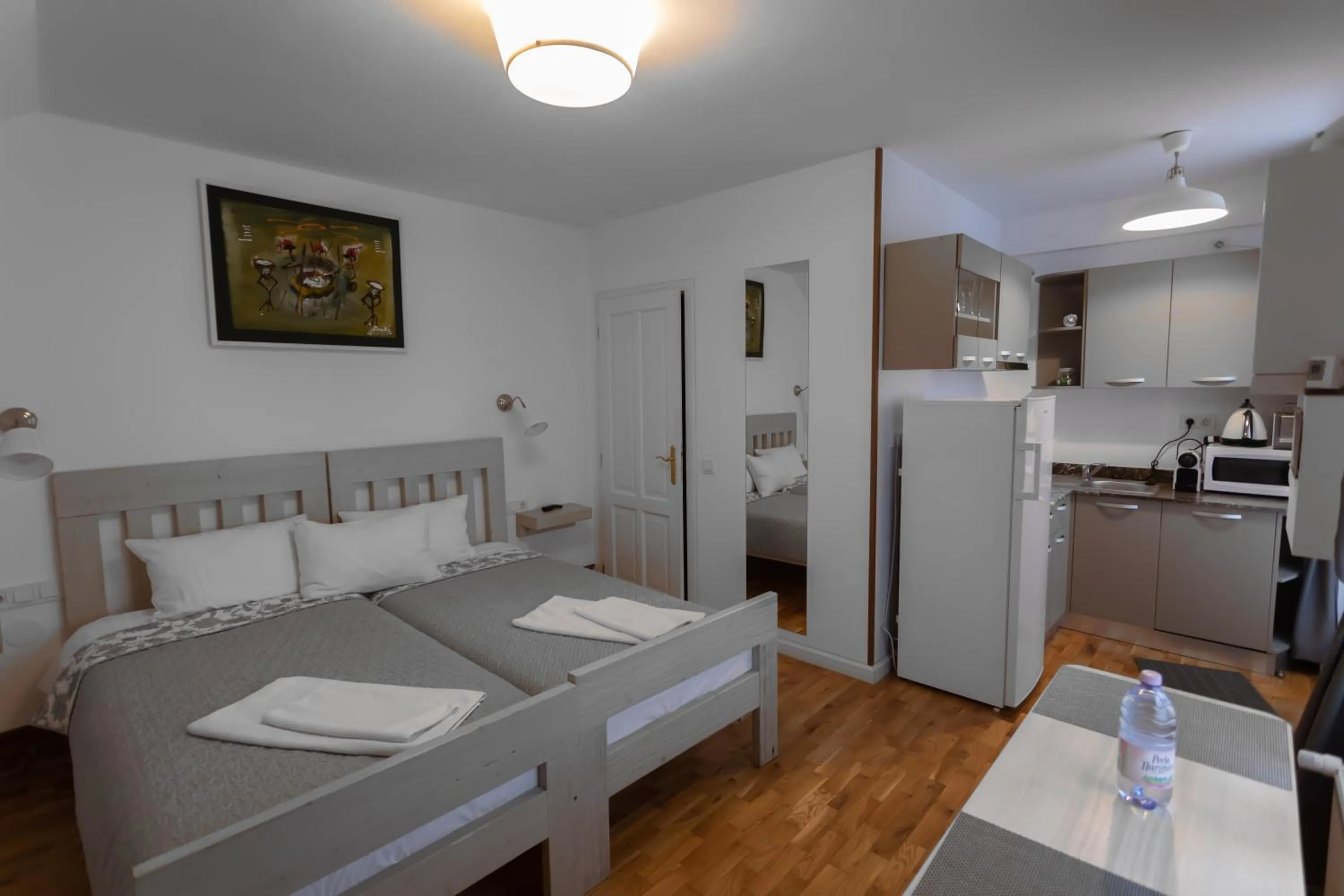 Bed in YellowBoot Aparthotel