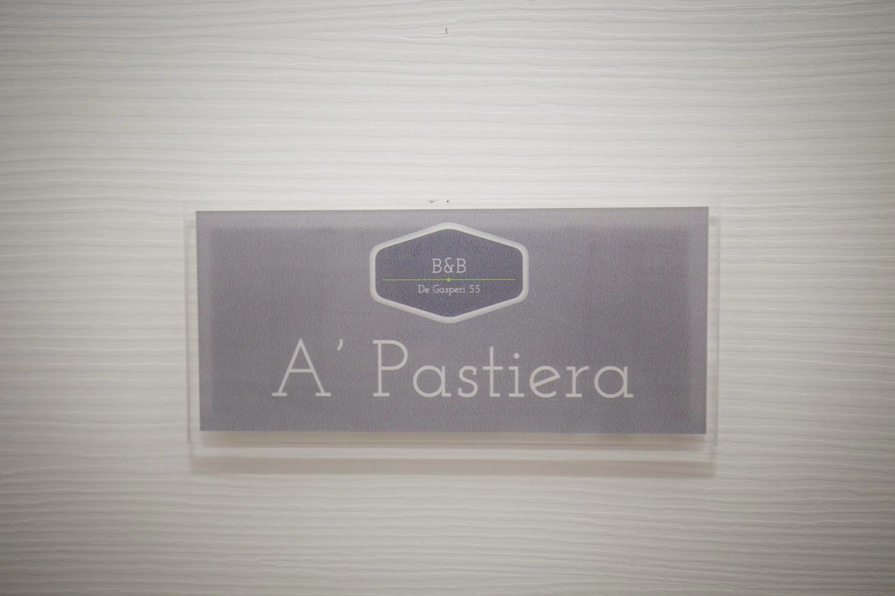 Property logo or sign in De Gasperi 55 - By Pera Rooms Collection