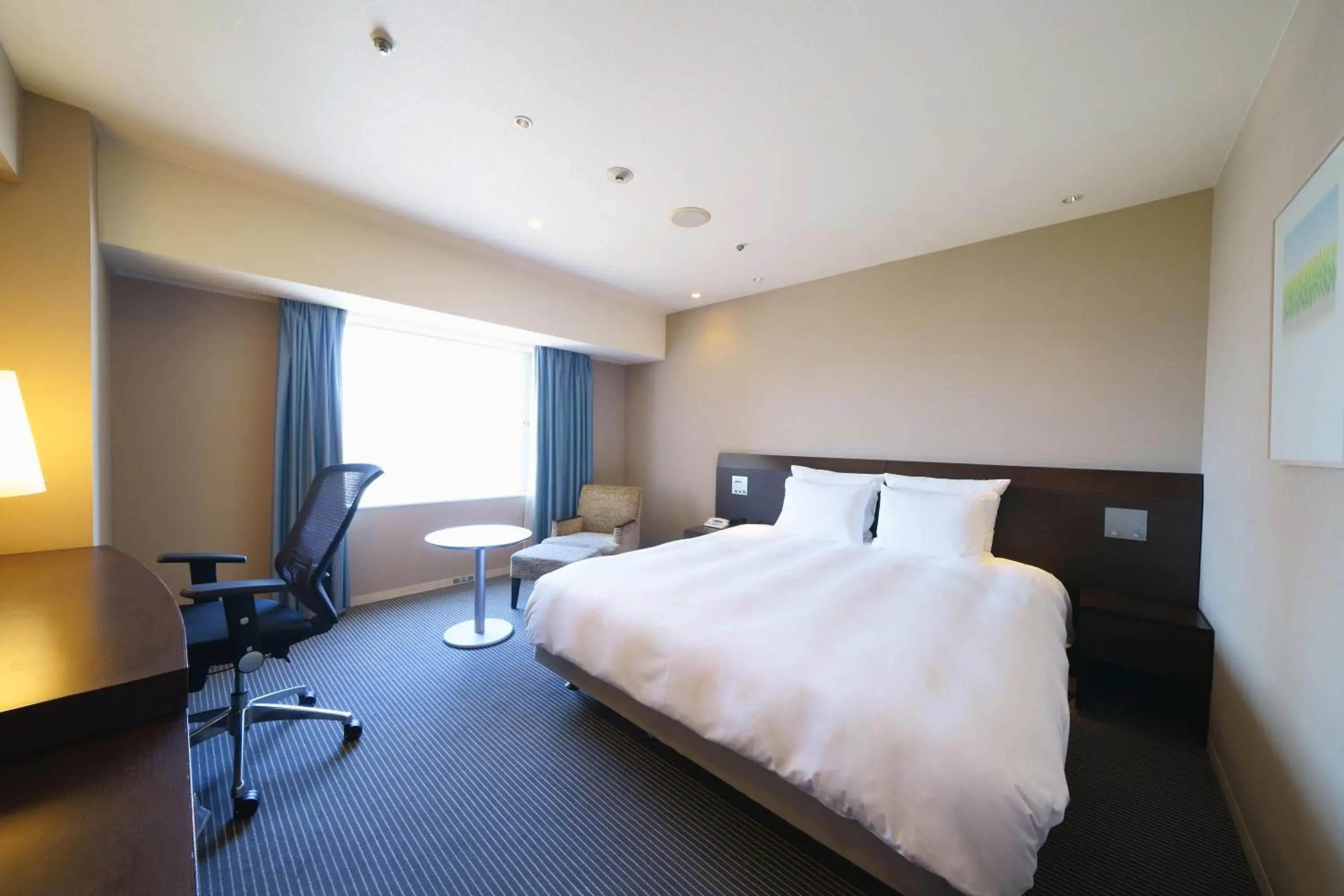 Bed in ANA Crowne Plaza Hiroshima by IHG Bed in ANA Crowne Plaza Hiroshima by IHG
