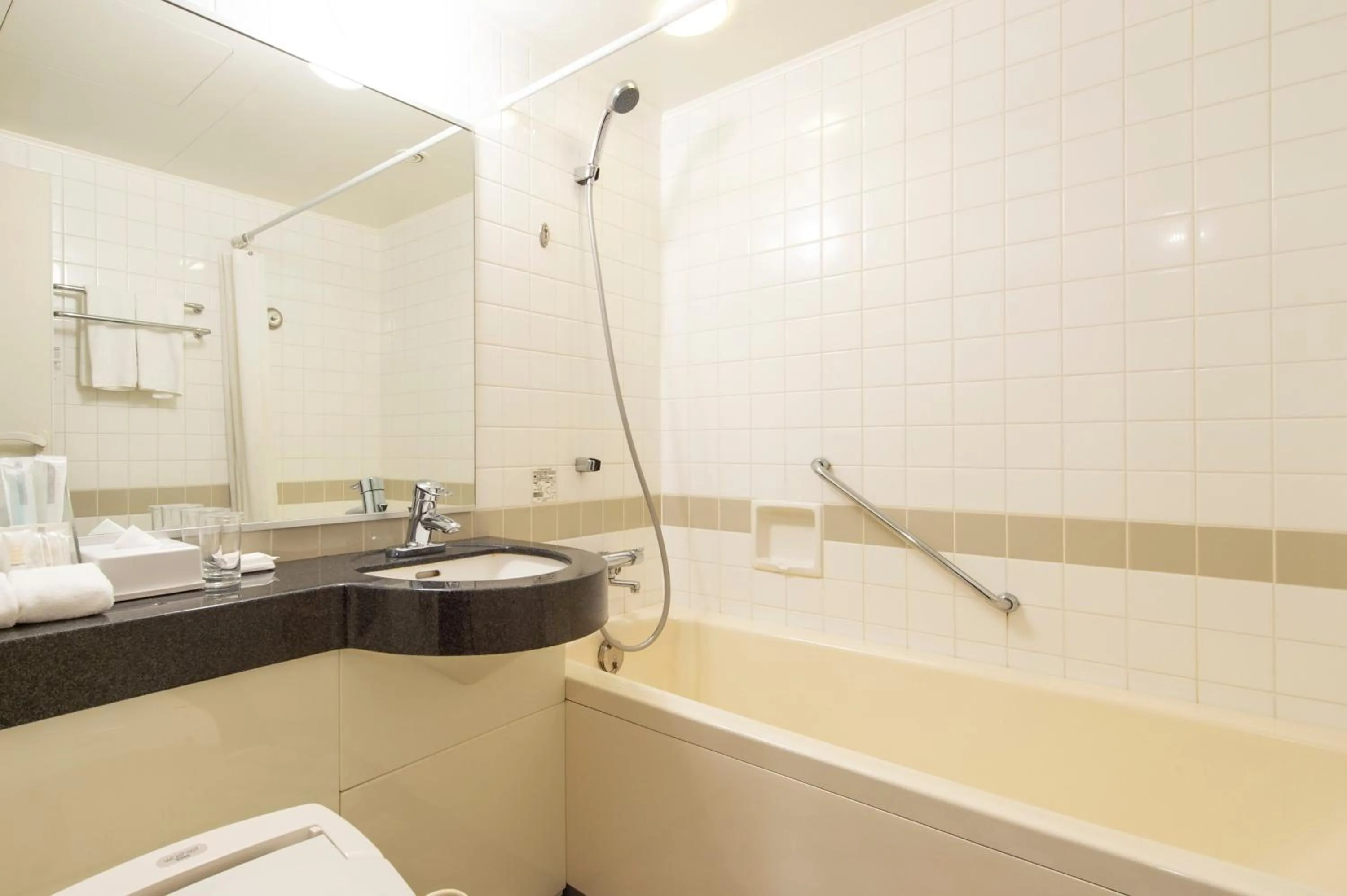 Bathroom in ANA Crowne Plaza Hiroshima by IHG