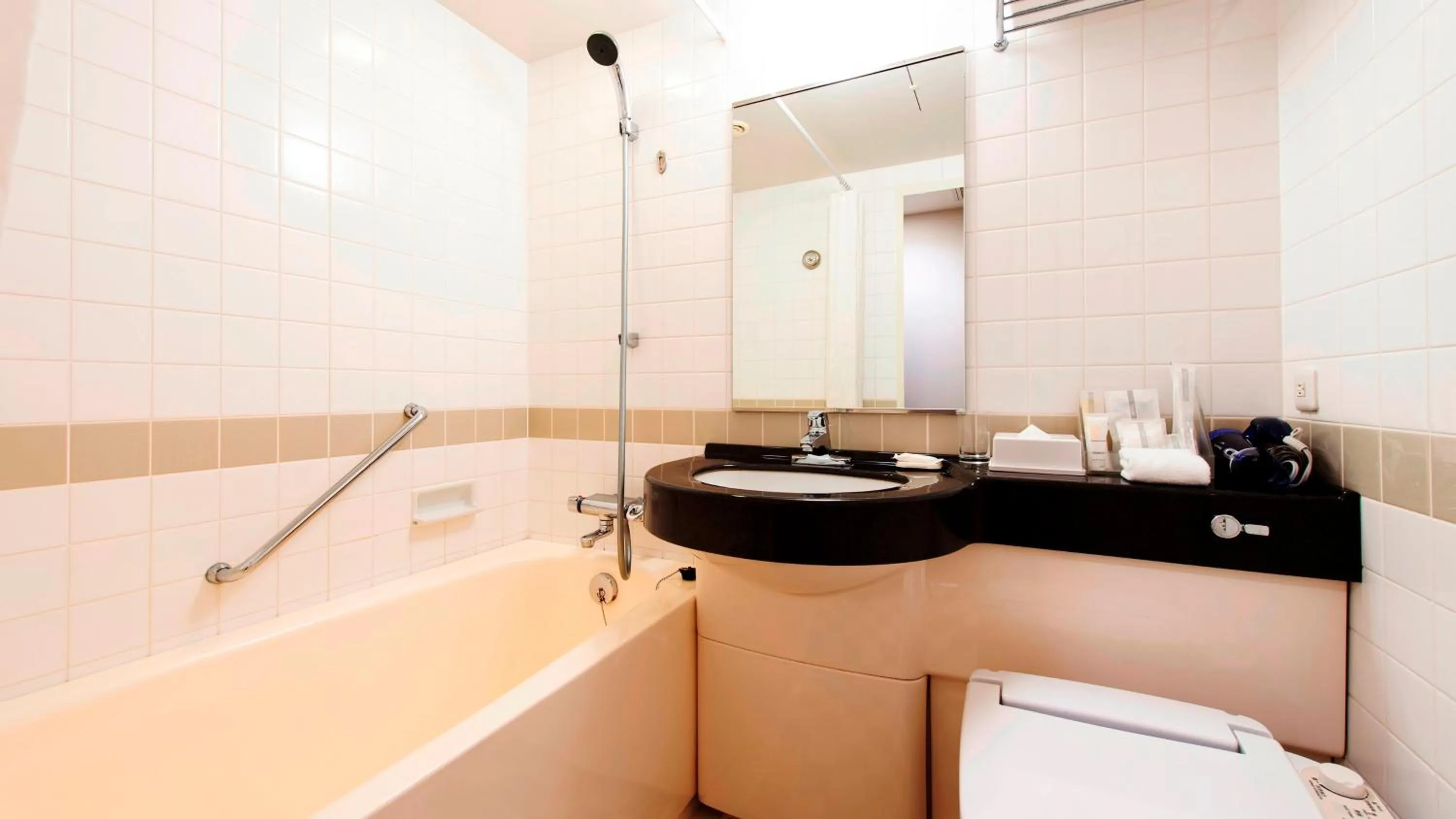 Bathroom in ANA Crowne Plaza Hiroshima by IHG