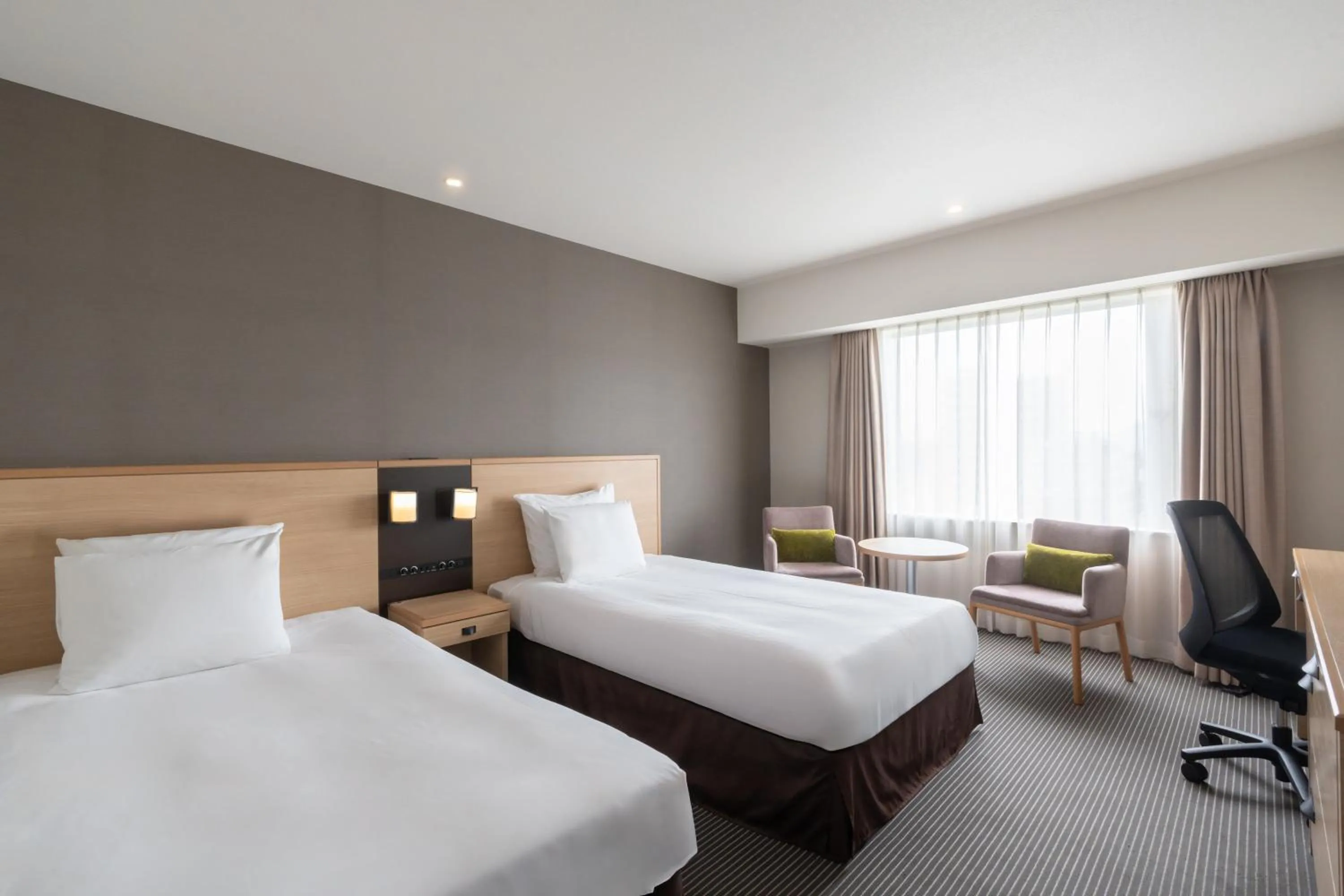 Photo of the whole room, Bed in ANA Crowne Plaza Hiroshima by IHG