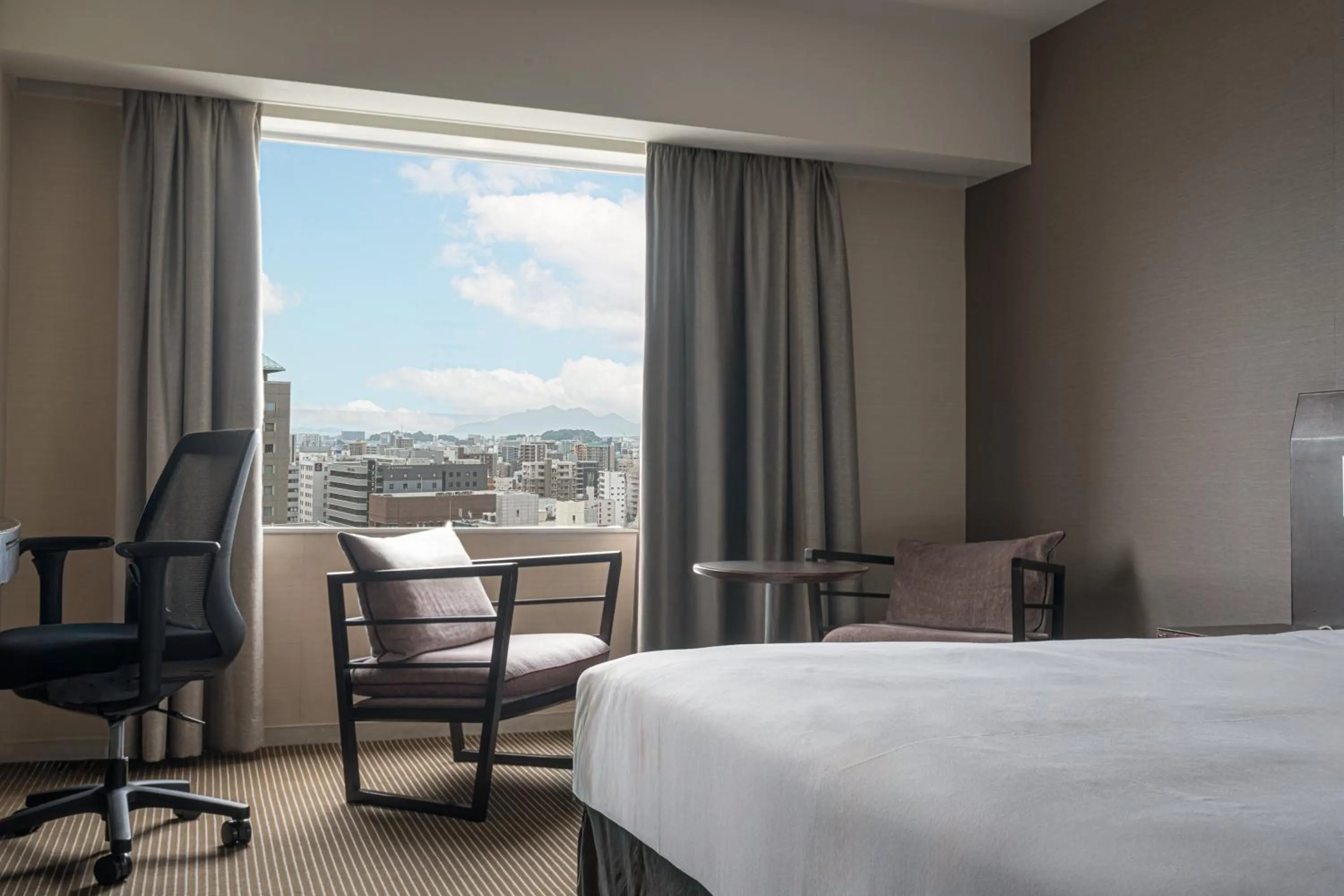 Photo of the whole room, Bed in ANA Crowne Plaza Hiroshima by IHG