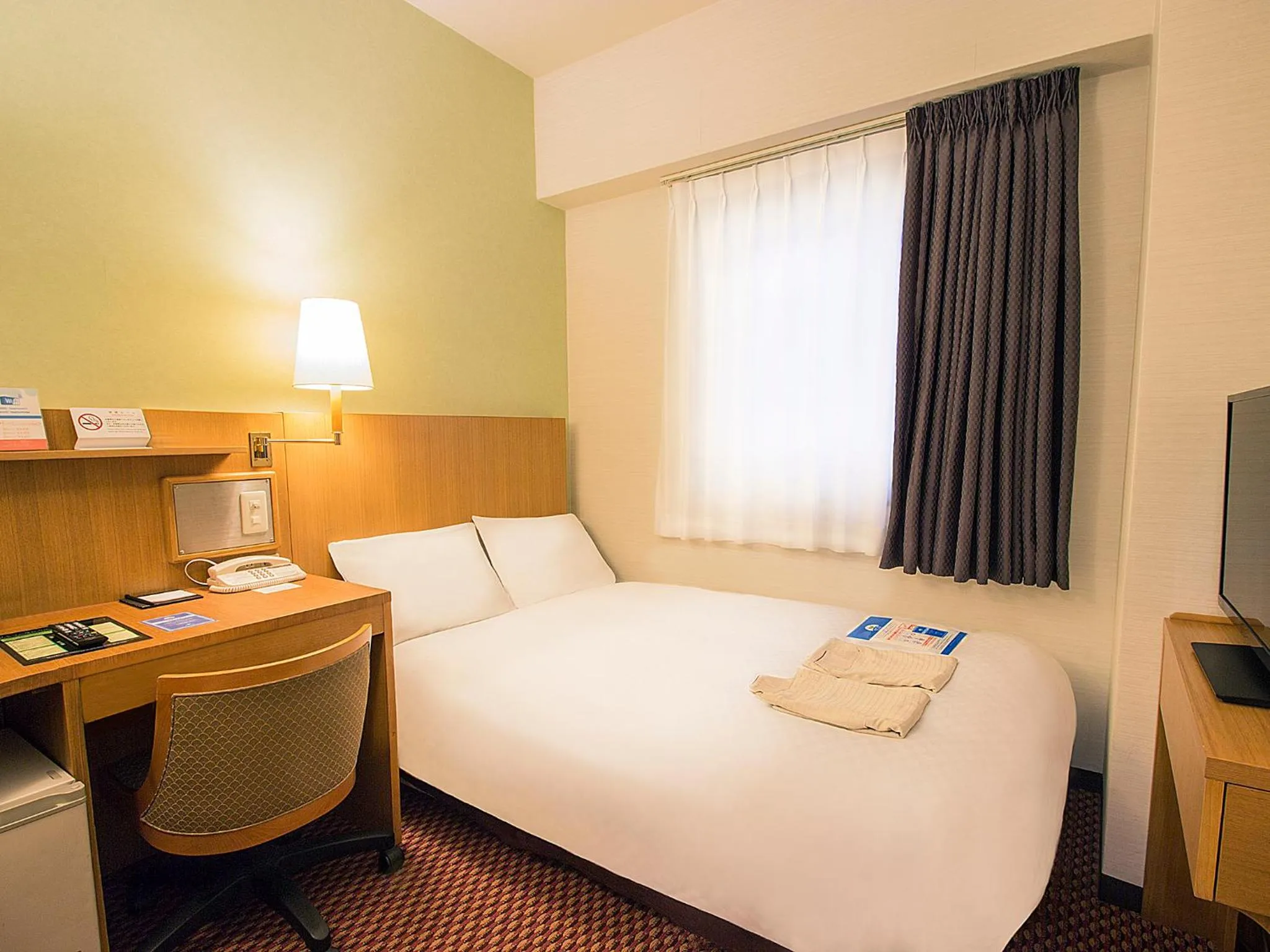 Photo of the whole room, Bed in Hearton Hotel Shinsaibashi