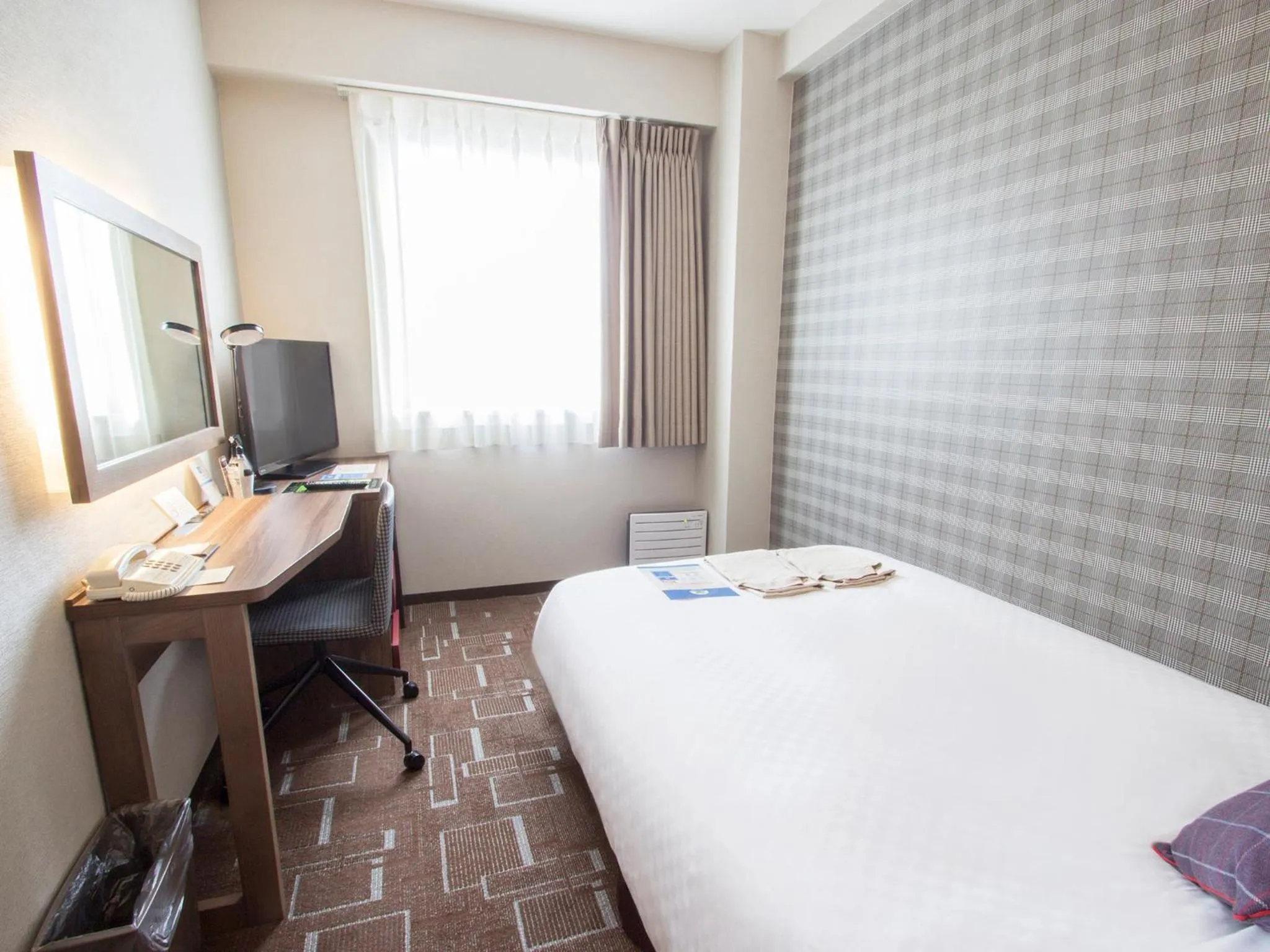 Photo of the whole room, Bed in Hearton Hotel Shinsaibashi