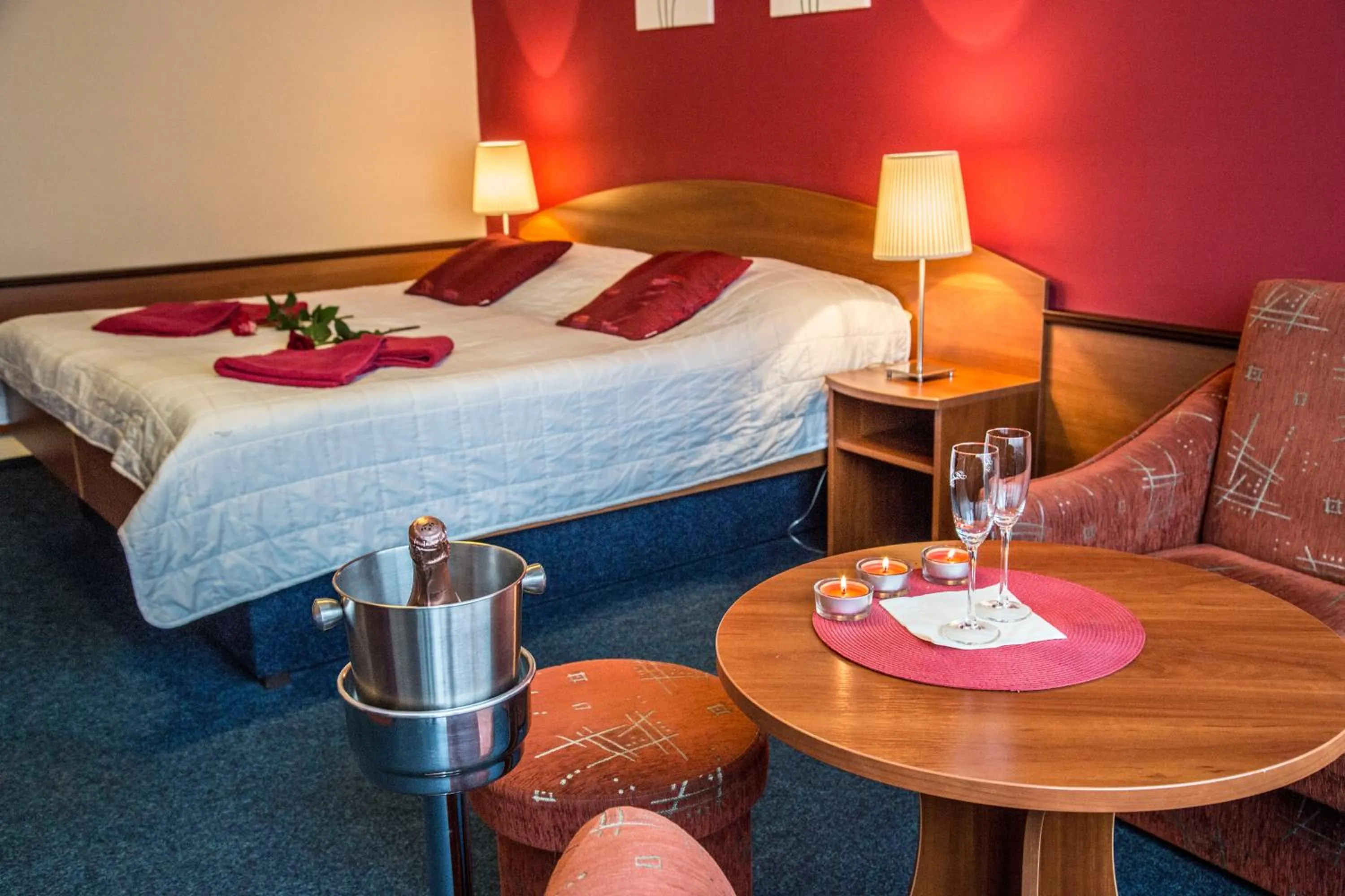 Seating area, Bed in Hotel Centrum Harrachov