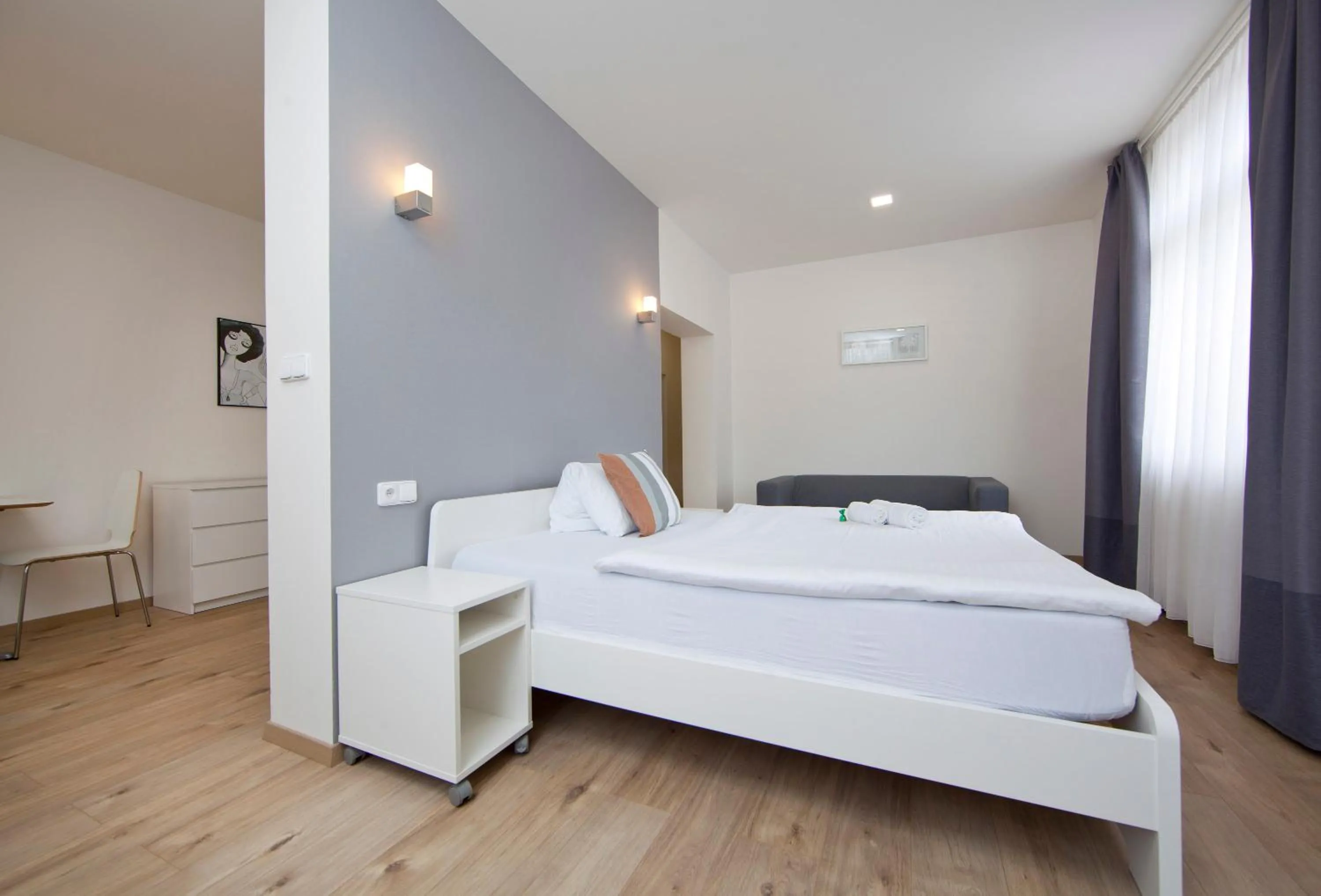 Bed in Rozmaryn Rooms & Apartments