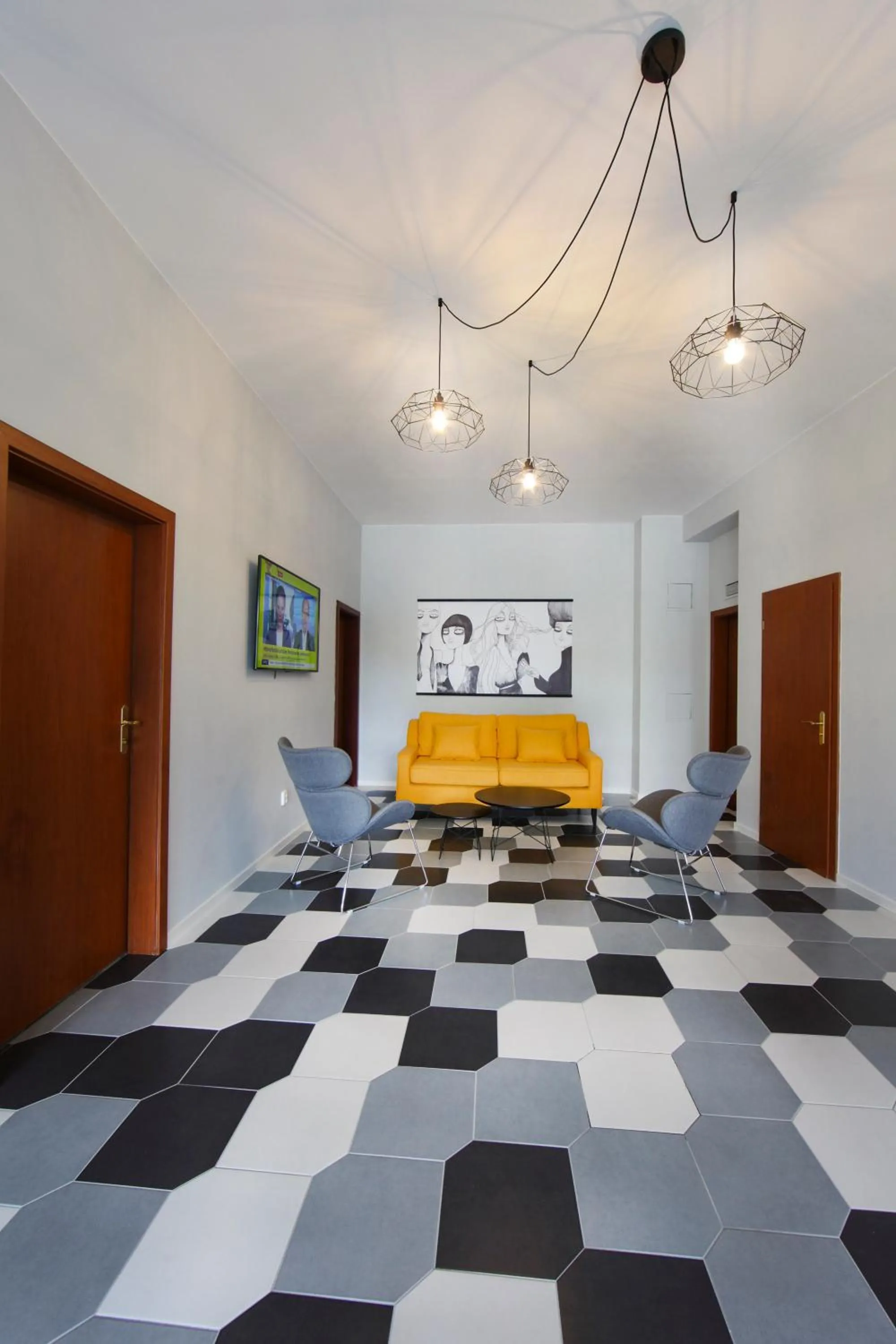 Communal lounge/ TV room in Rozmaryn Rooms & Apartments