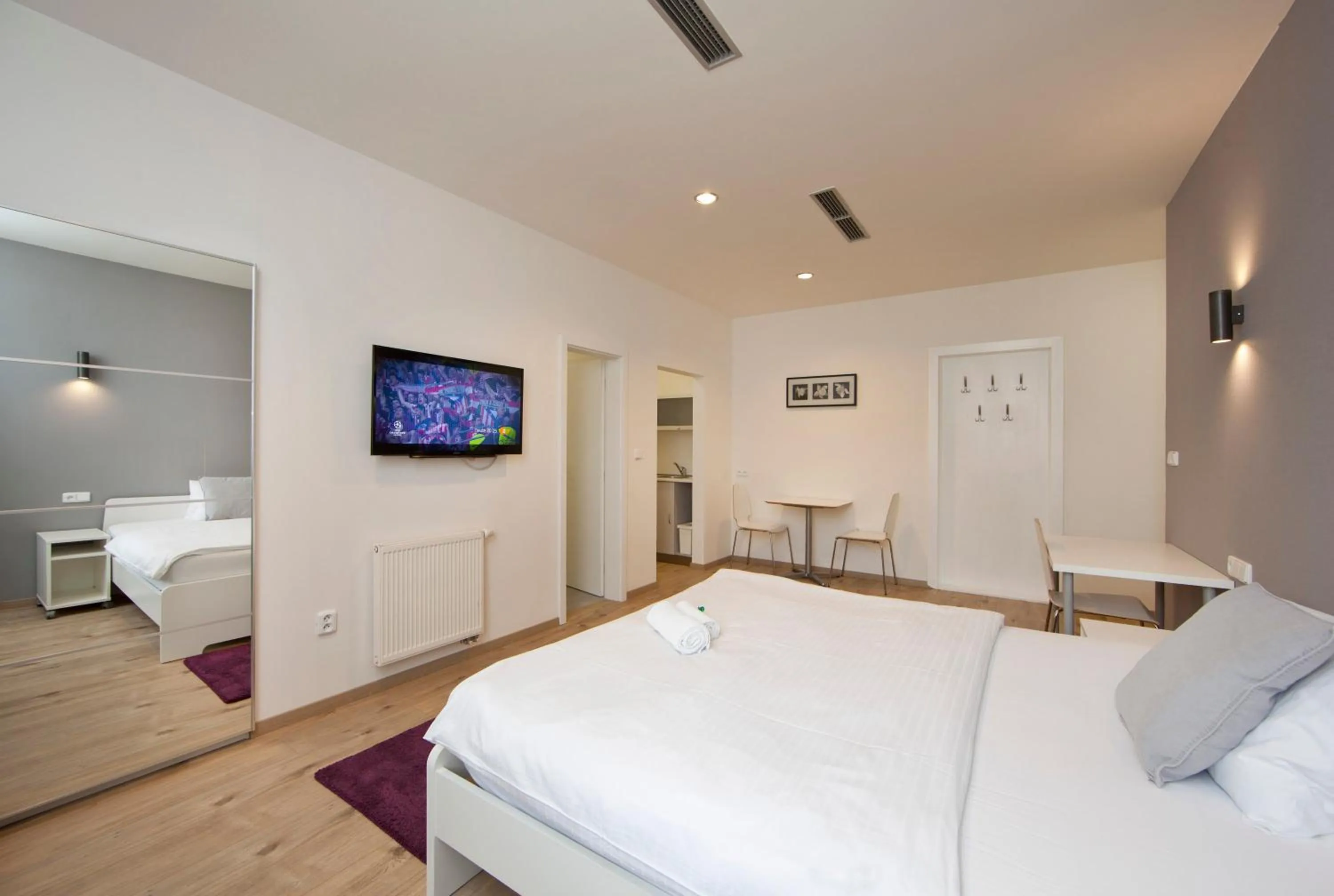 Bed in Rozmaryn Rooms & Apartments