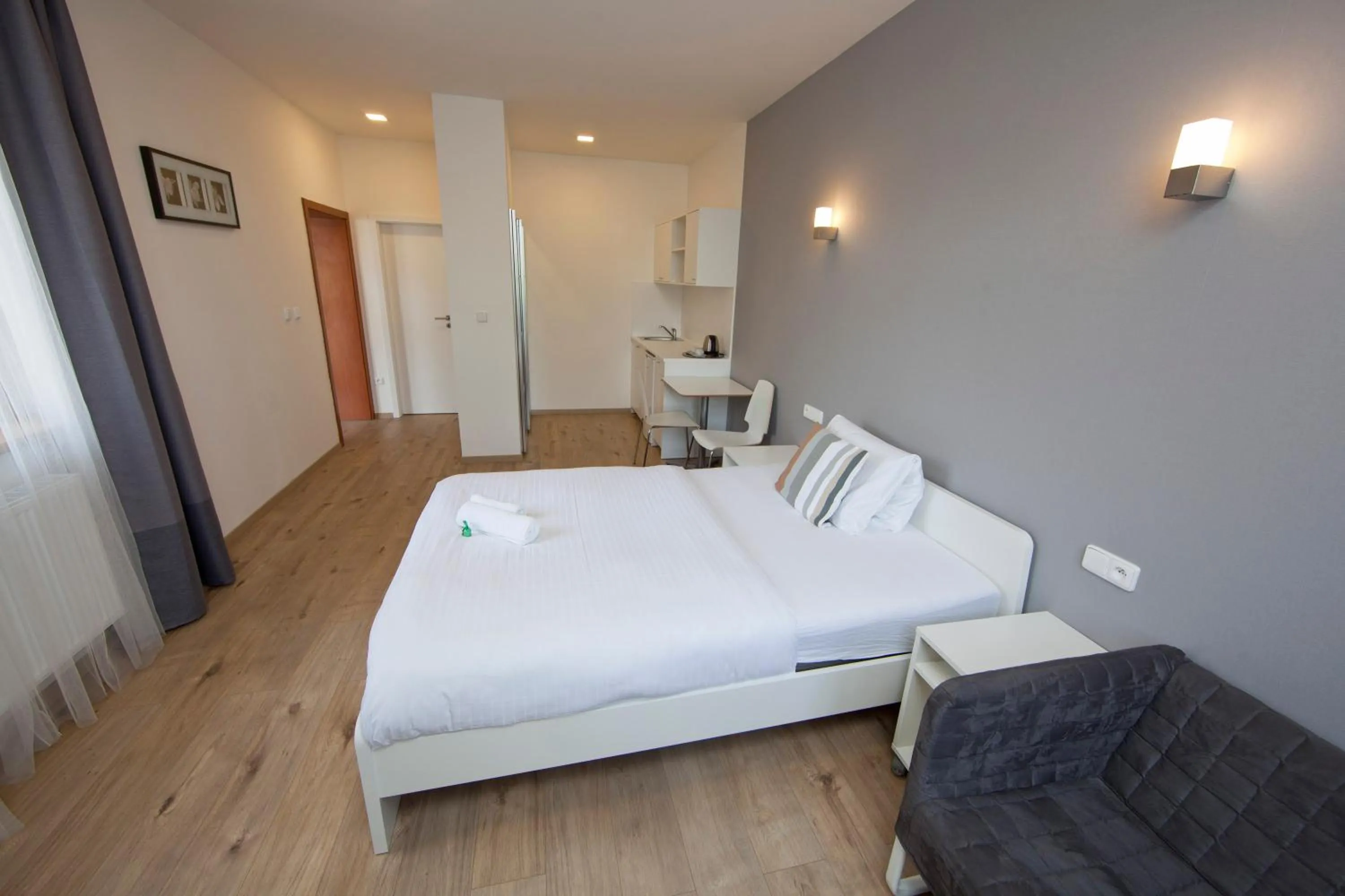 Bed in Rozmaryn Rooms & Apartments