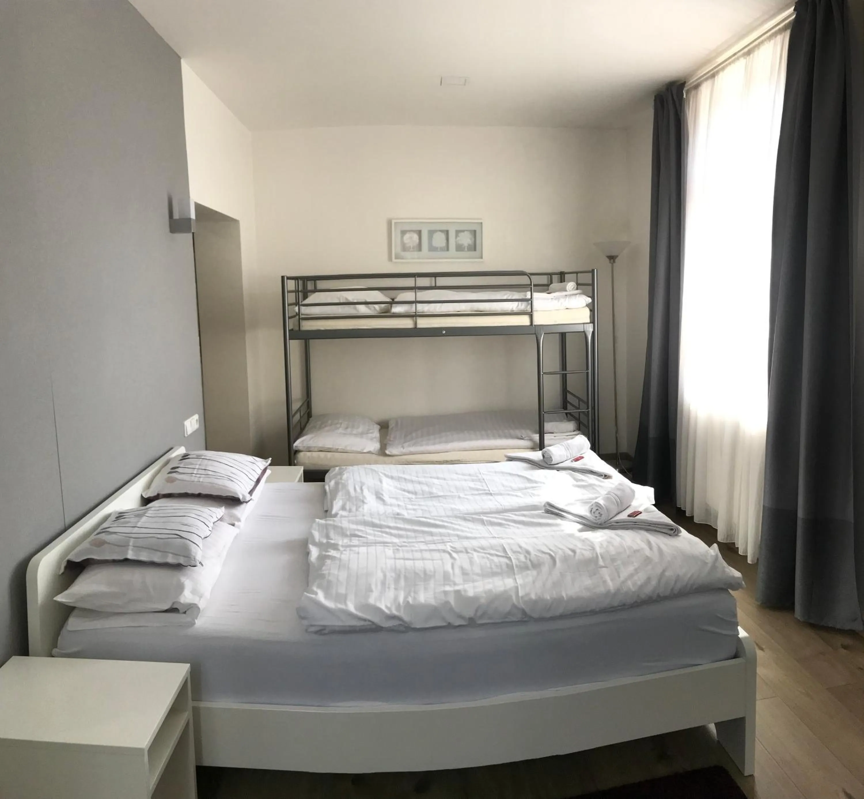 Bed in Rozmaryn Rooms & Apartments