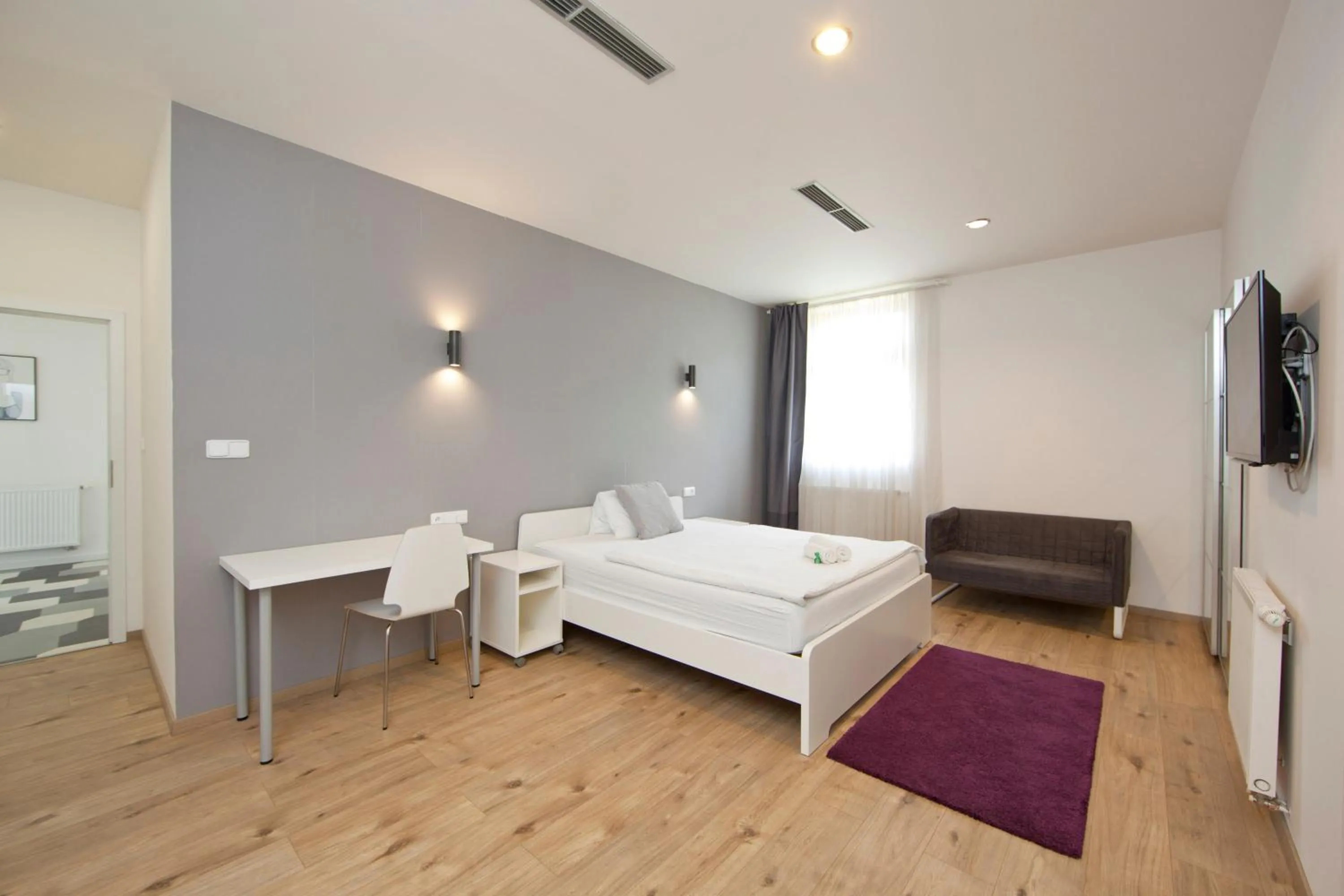 Bed in Rozmaryn Rooms & Apartments