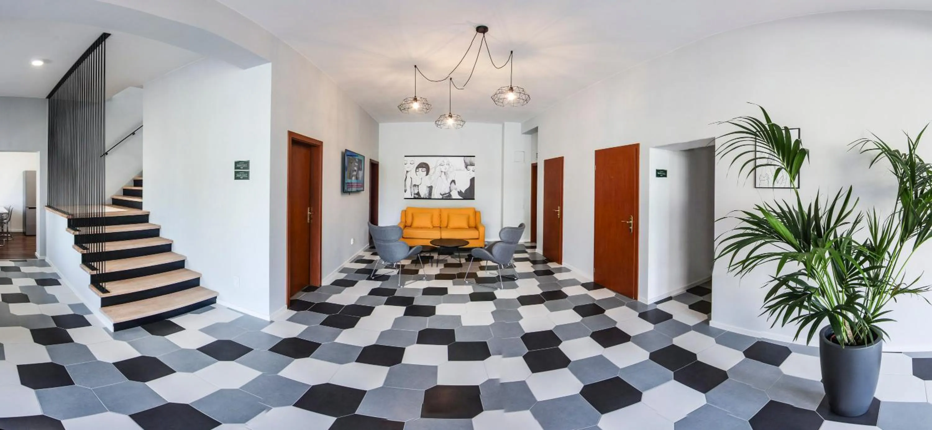 Communal lounge/ TV room in Rozmaryn Rooms & Apartments