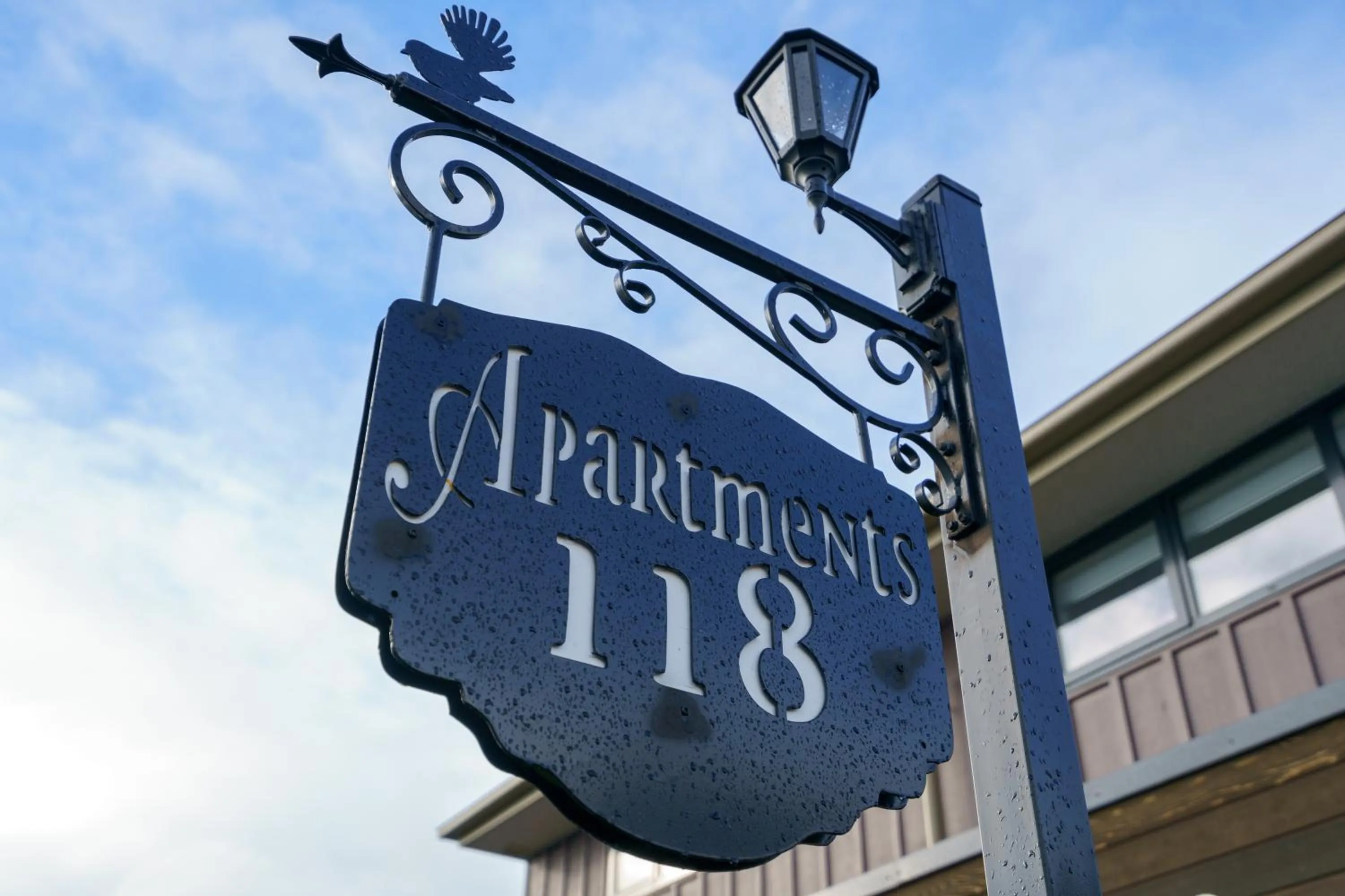 Property logo or sign in Apartments 118