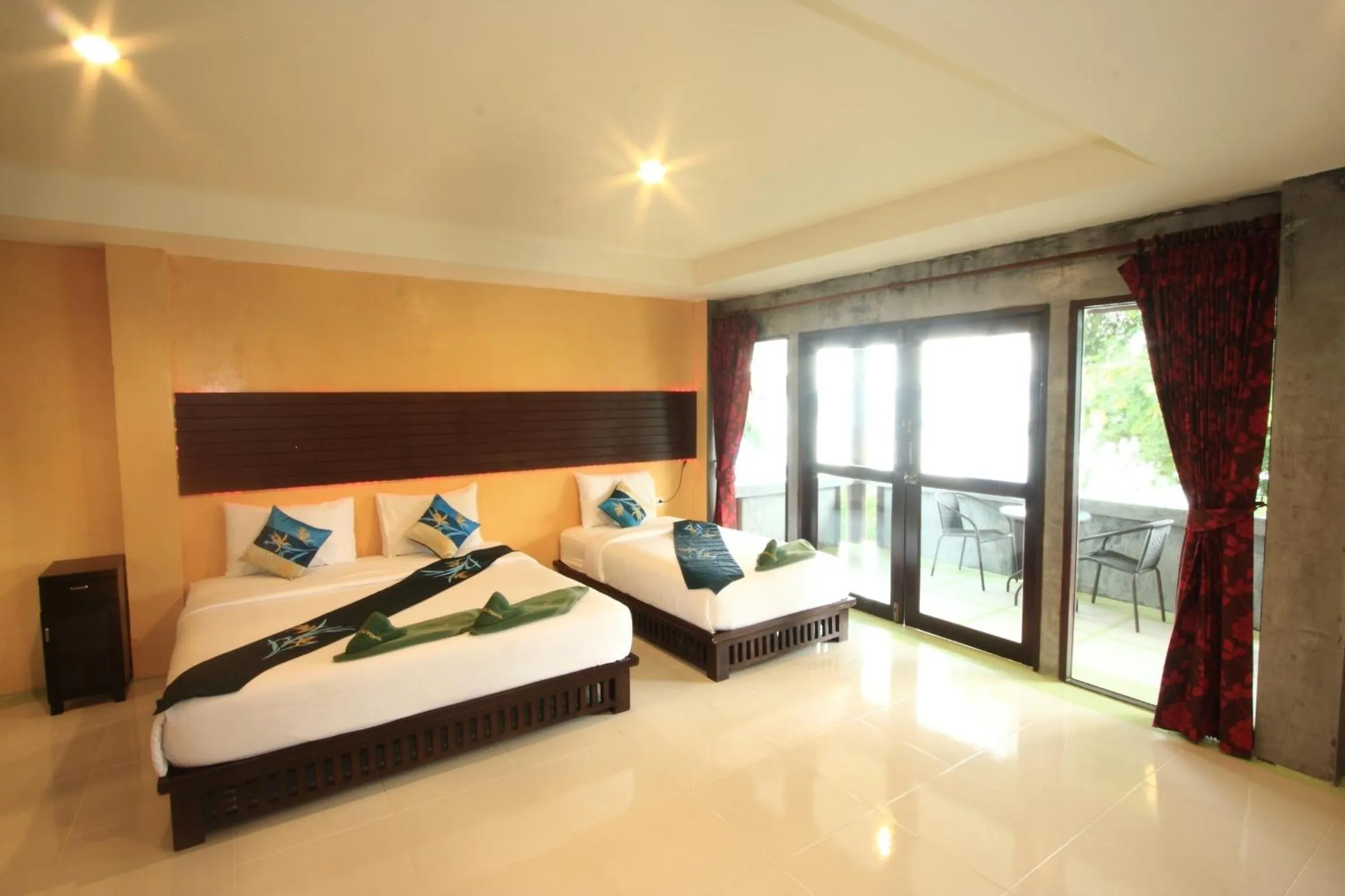 Bed in Tharathip Resort Koh Phangan - SHA Plus