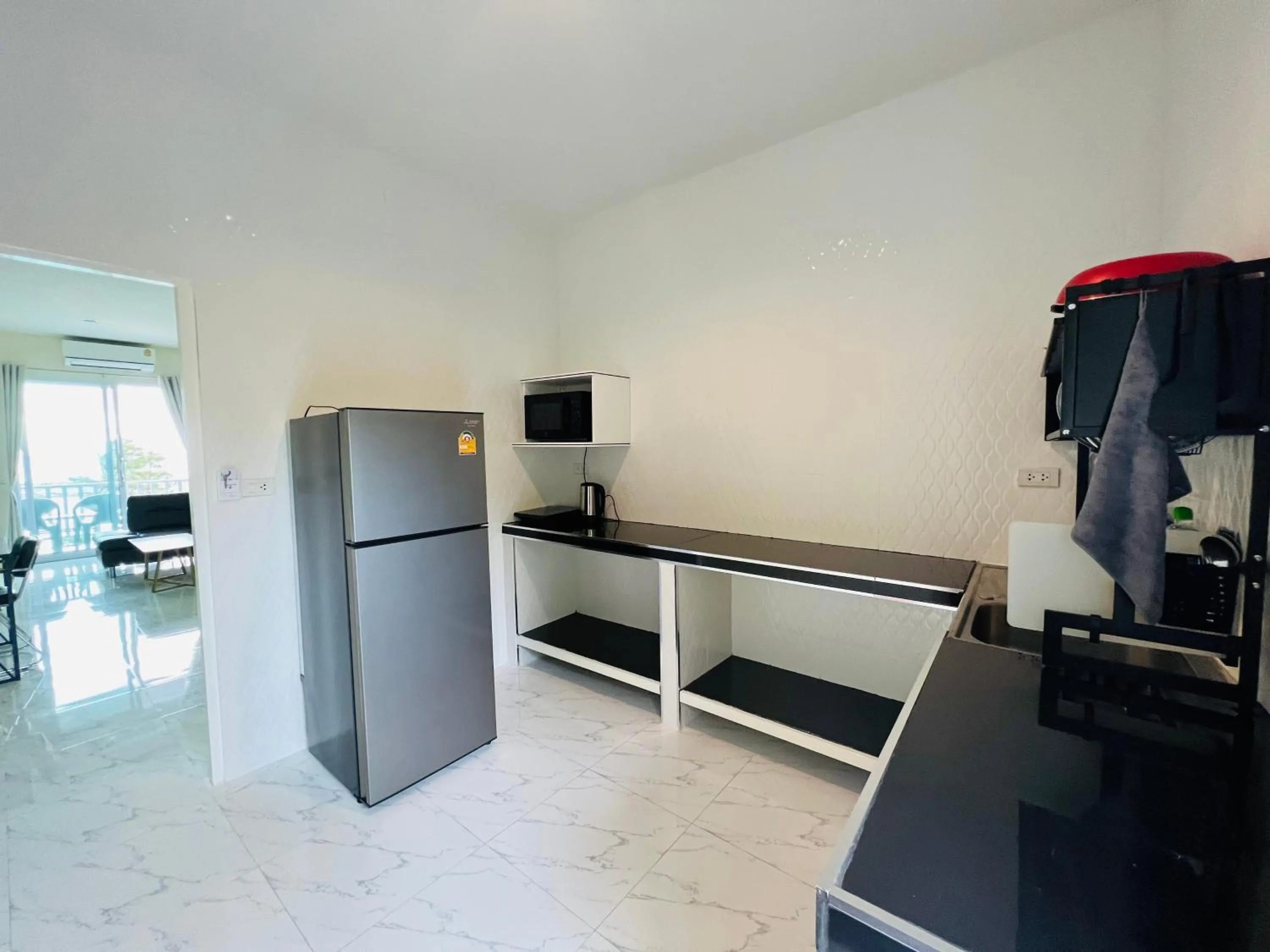 Kitchen or kitchenette in Tharathip Resort Koh Phangan - SHA Plus